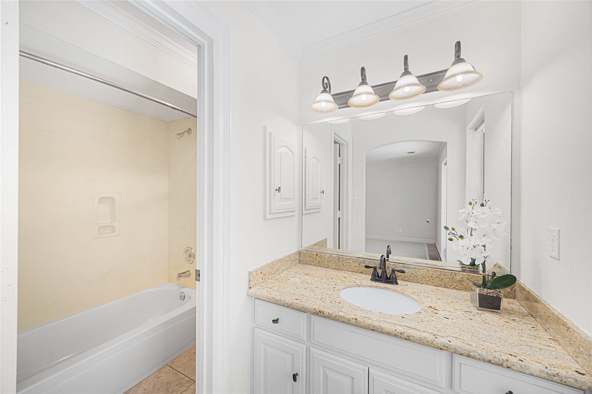 11822 Primwood Drive, Houston, TX 77070 En-suite bath providing comfort and privacy.