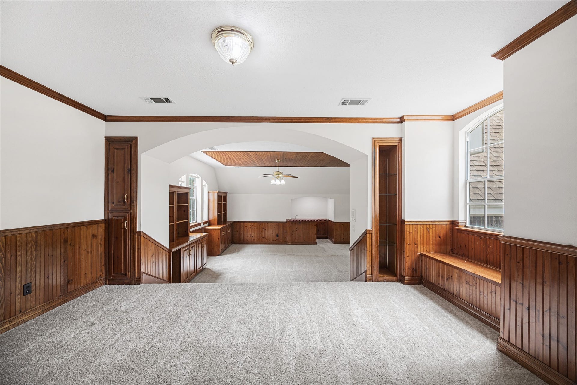 11822 Primwood Drive, Houston, TX 77070 Spacious game room with custom woodwork and endless possibilities.