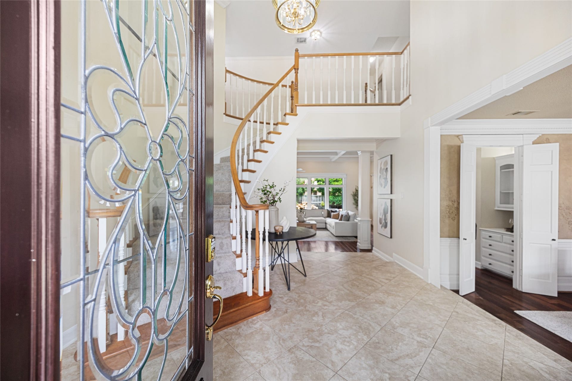 11822 Primwood Drive, Houston, TX 77070 Elegant front entry with soaring ceilings and sweeping staircase.
