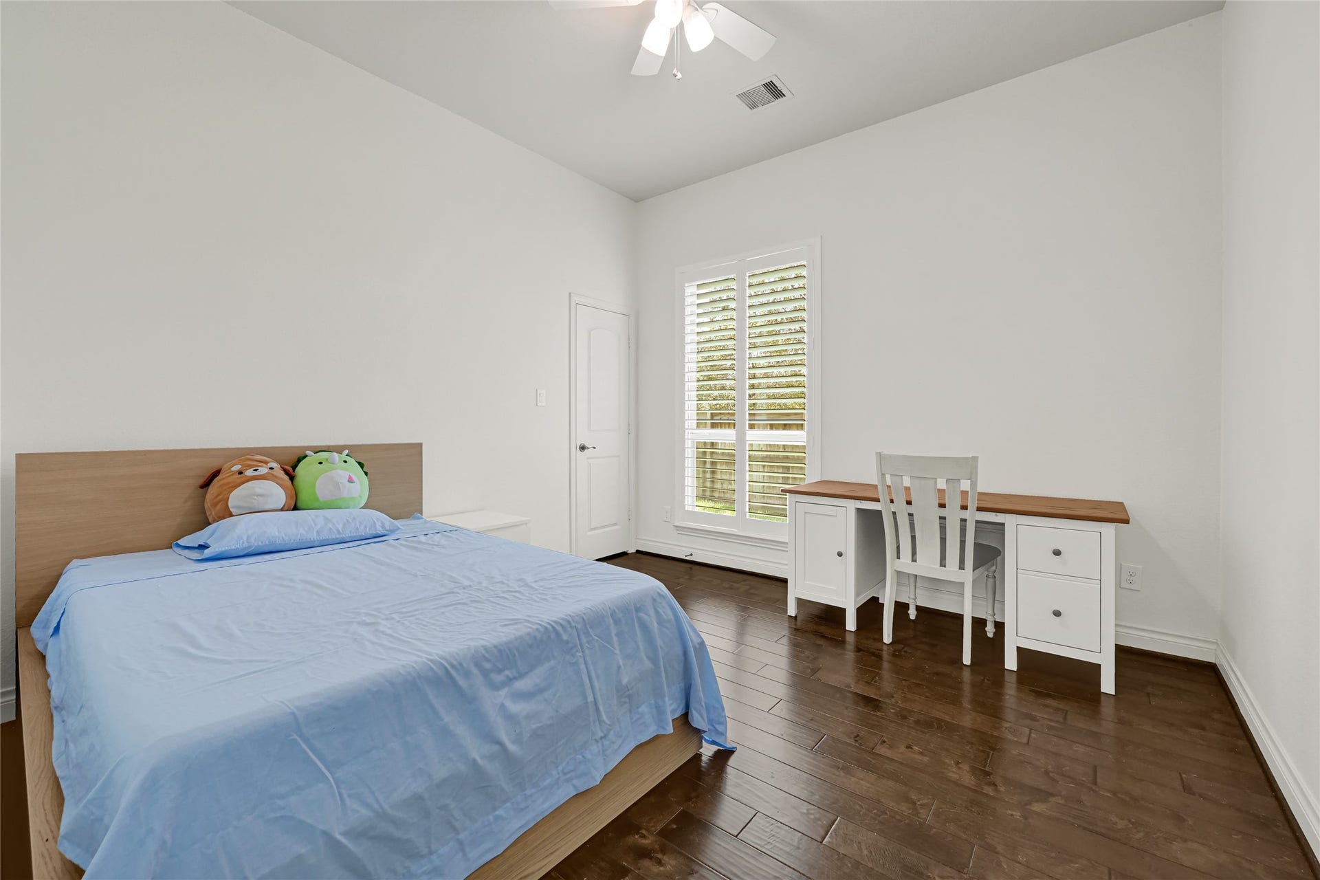 This elegant full bath, featuring a sleek granite countertop and modern fixtures, conveniently serves both Bedroom 3 and Bedroom 4, offering style and functionality.