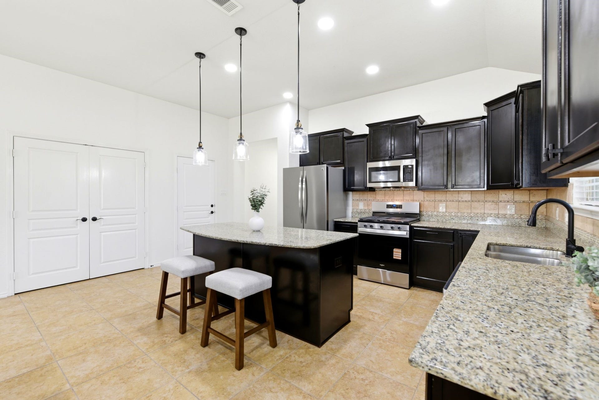 25322 Alverstone Drive, Katy, TX 77494 The granite kitchen features NEW stainless-steel appliances