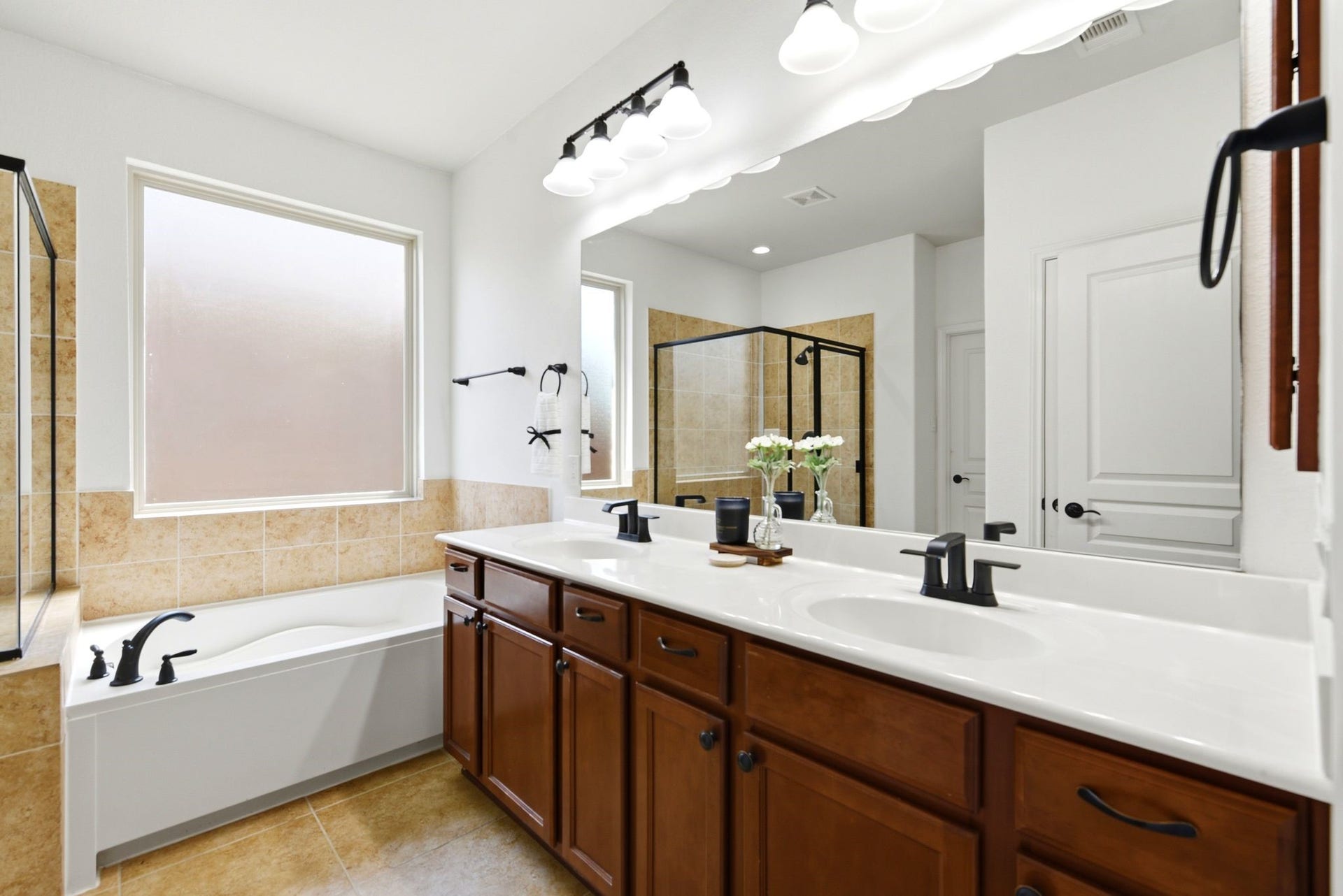 25322 Alverstone Drive, Katy, TX 77494 updated lighting and bathroom fixtures,