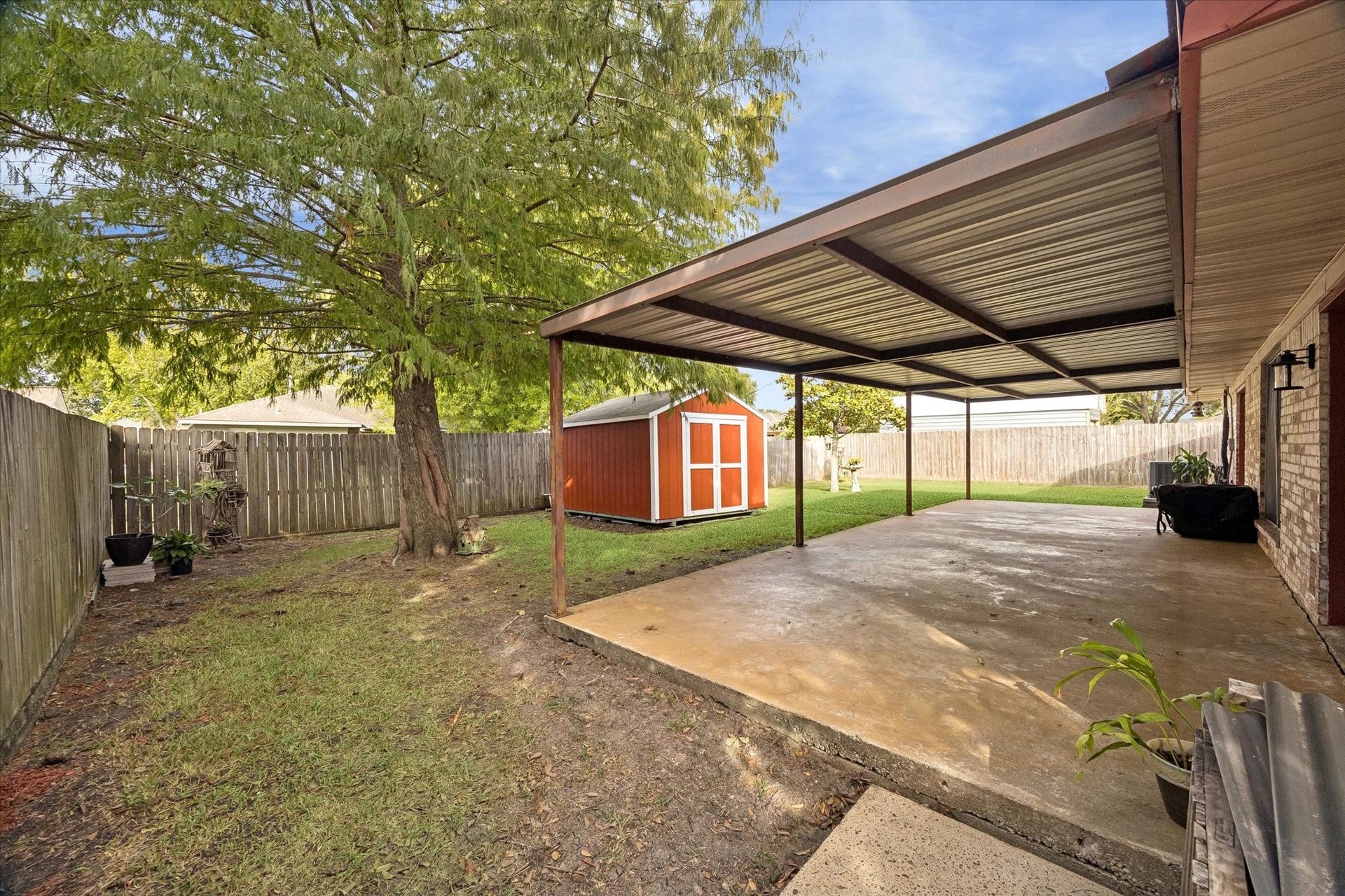 he expansive covered area provides plenty of room for comfortable seating, outdoor dining, and gathering with family and friends.