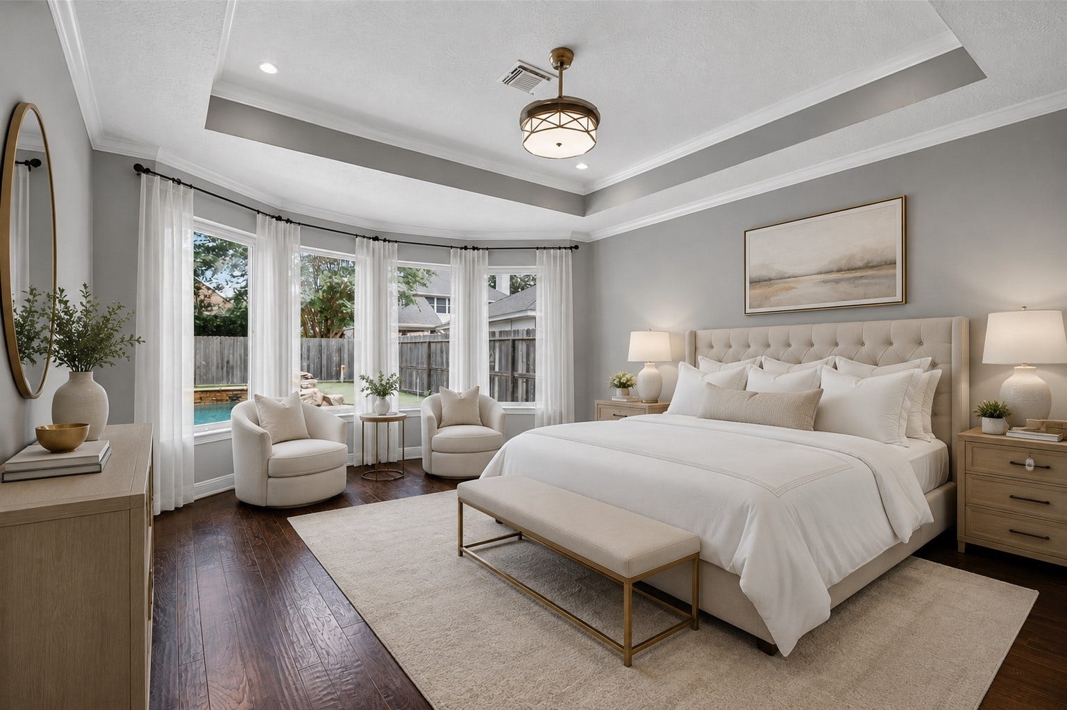 11810 Rue Beaujon Court, Tomball, TX 77377 Primary bedroom virtually staged to showcase the tray ceiling, bay of windows, real wood floors and generous scale.