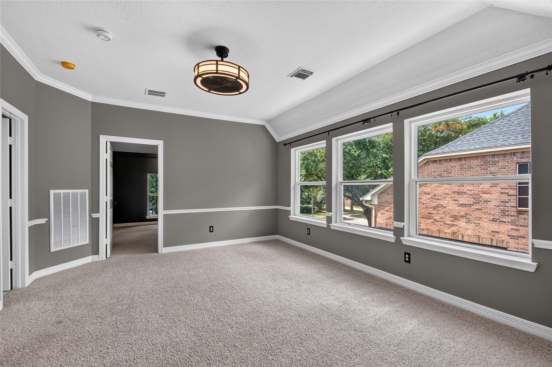 11810 Rue Beaujon Court, Tomball, TX 77377 Spacious upstairs game room offers a flexible second living area with abundant natural light.