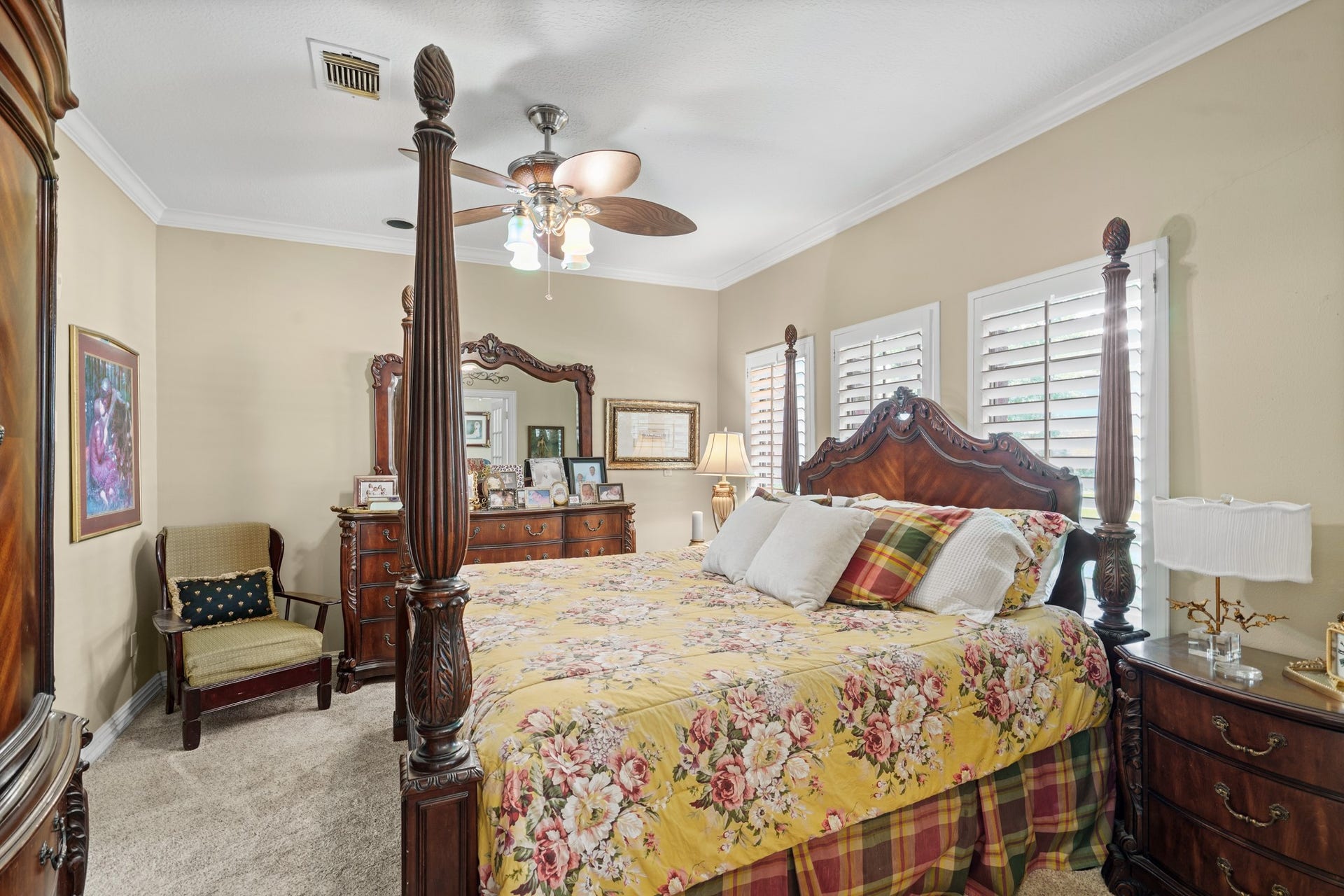 Cozy primary bedroom, plantation shutters