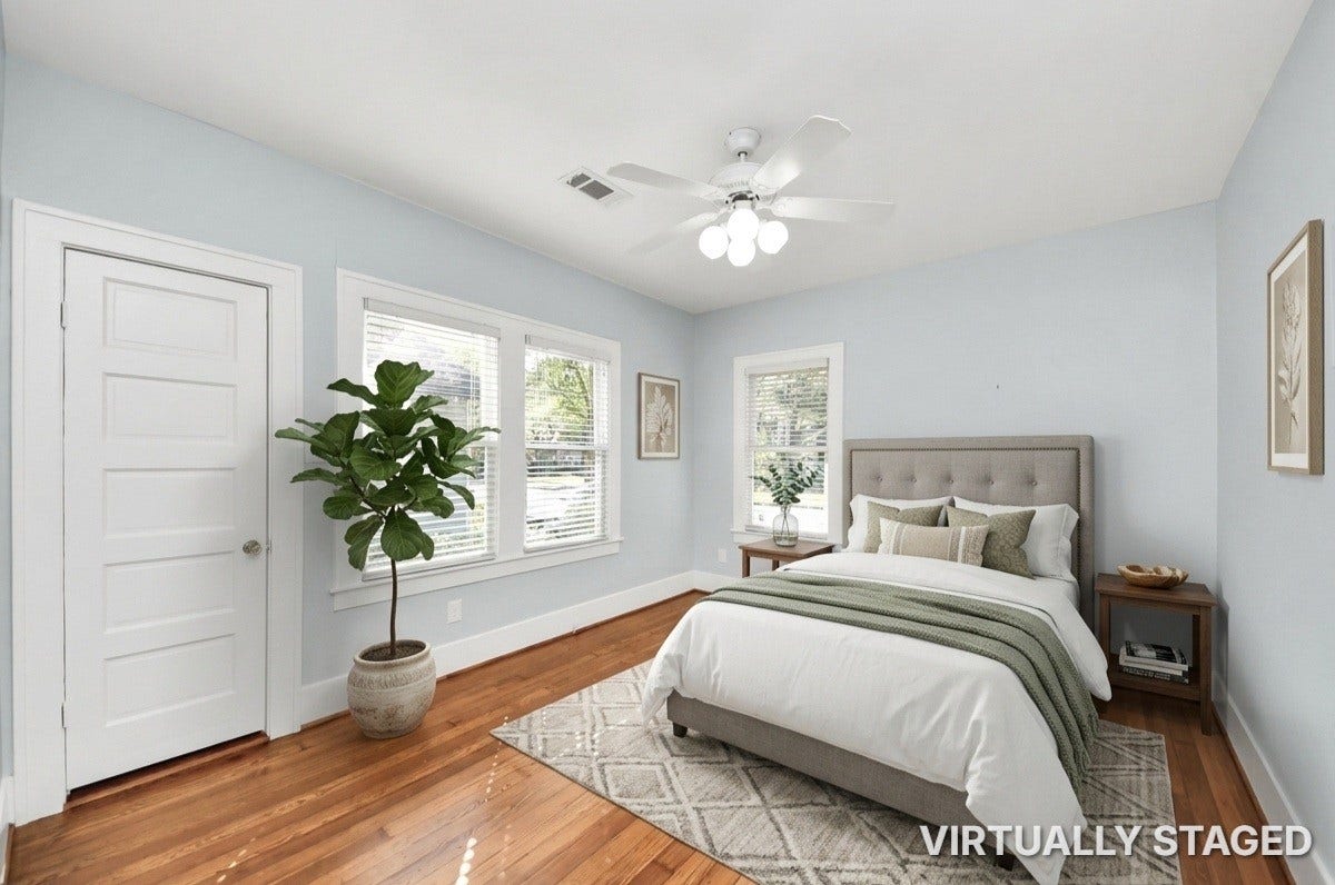 909 Fugate Street, Houston, TX 77009 Experience comfort and style in Bedroom 3, featuring abundant natural light, elegant hardwood floors, and a soothing color palette.