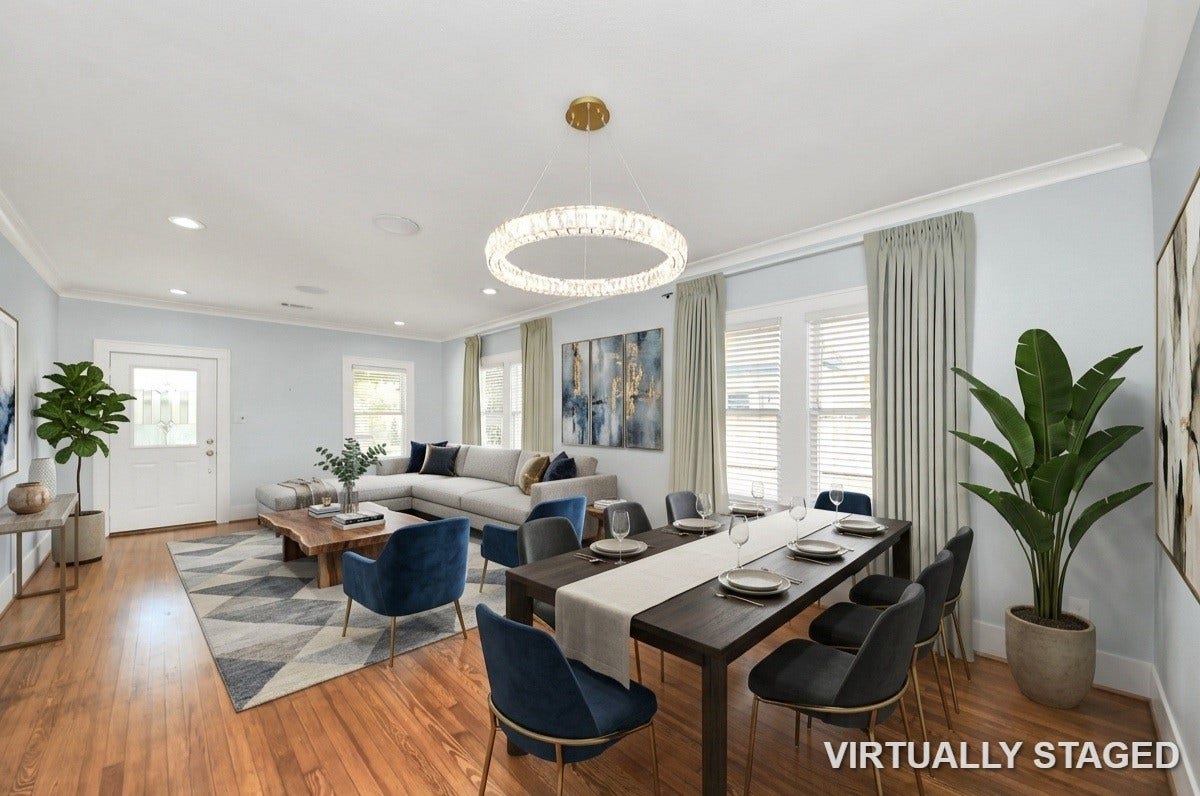 909 Fugate Street, Houston, TX 77009 Elegant open-concept living and dining area featuring hardwood floors, modern lighting, and abundant natural light.