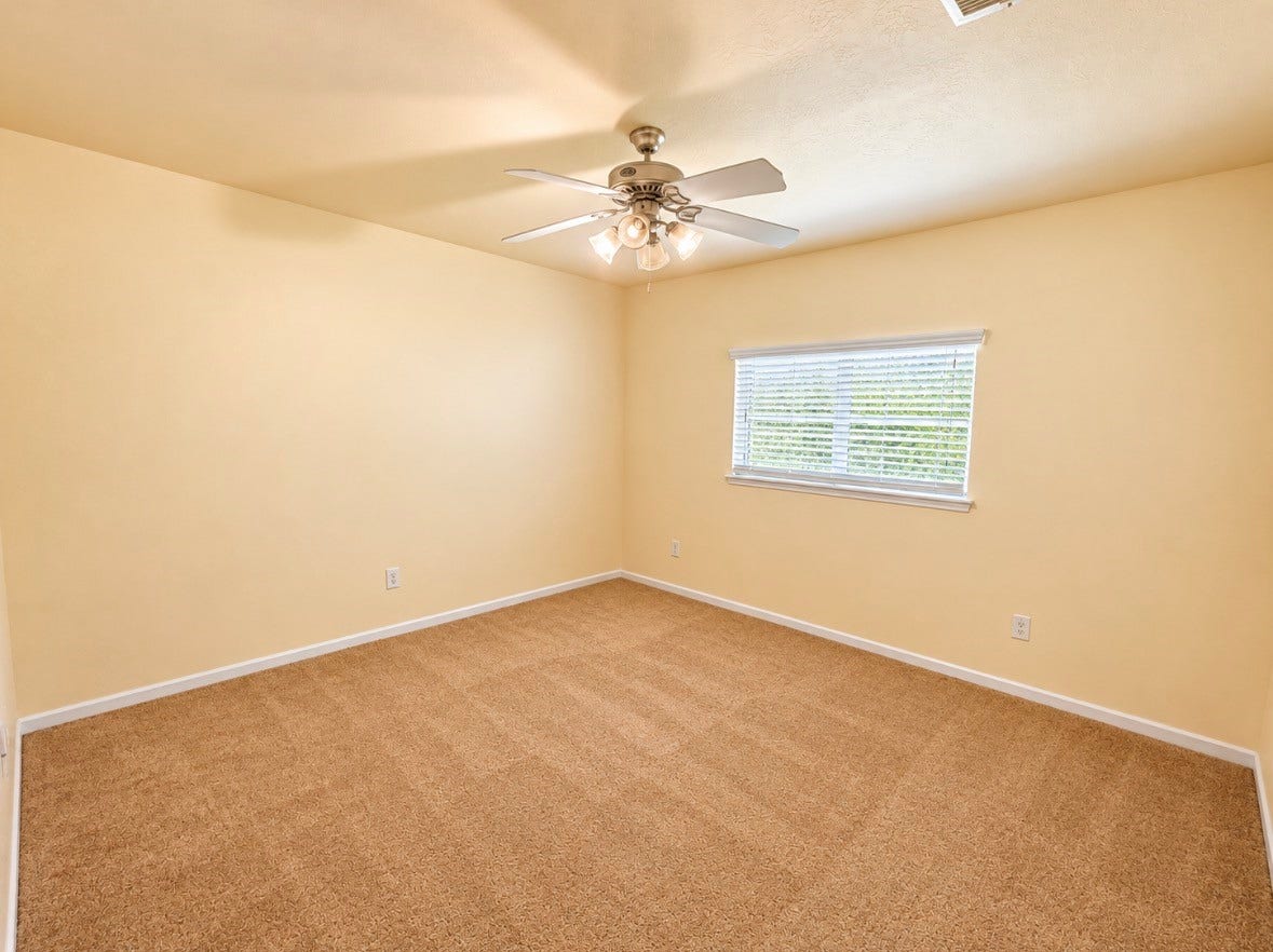 3722 Elderberry Drive, Dickinson, TX 77539 Generously sized secondary bedroom ready to become a comfortable retreat.