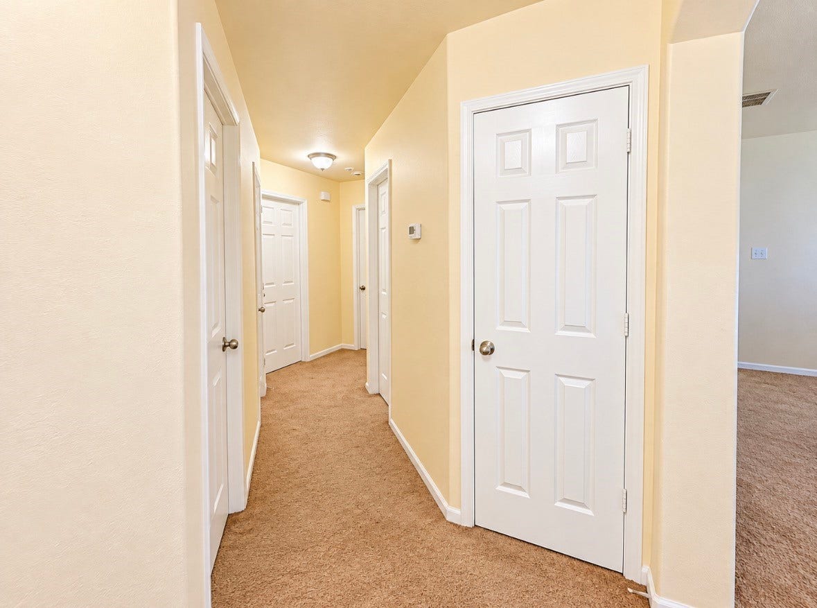 3722 Elderberry Drive, Dickinson, TX 77539 Thoughtfully arranged hallway connecting the bedrooms & living spaces.