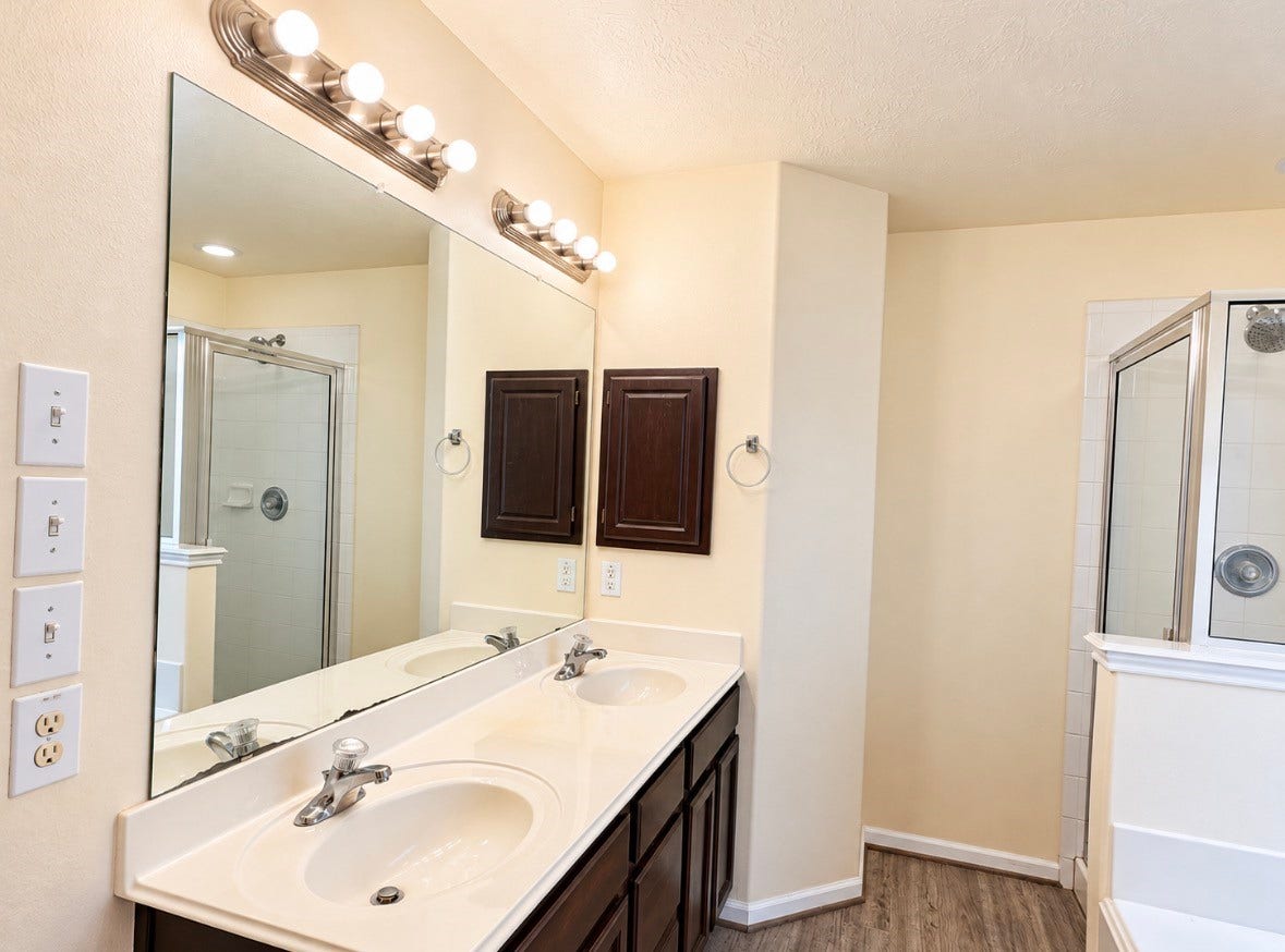 3722 Elderberry Drive, Dickinson, TX 77539 En-suite bathroom featuring dual sinks, generous vanity space & a separate shower.