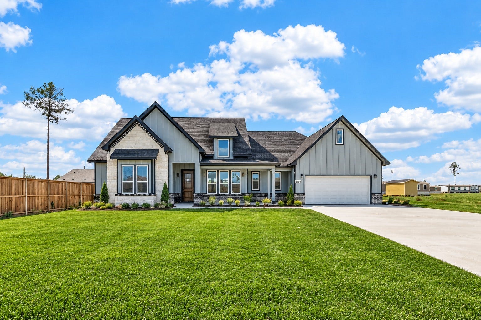Stunning modern farmhouse exterior with excellent curb appeal and a welcoming front porch.
