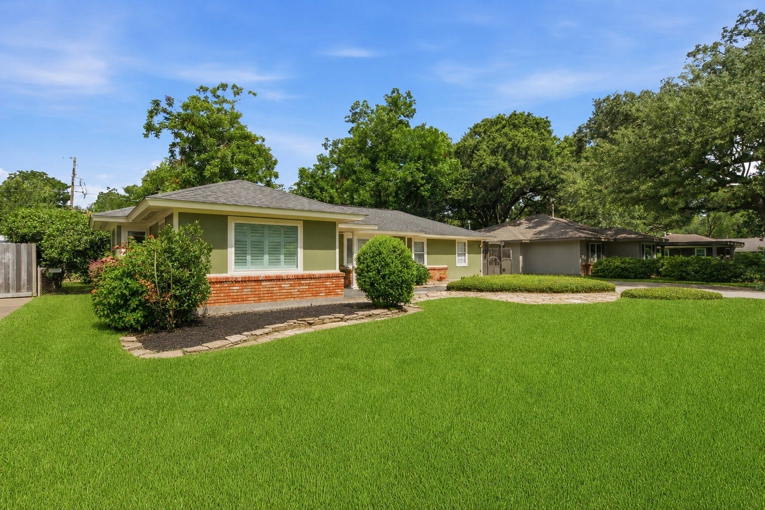 410 Kyle Street, Sugar Land, TX 77478 The home's 2020 exterior improvements include fresh paint, durable Hardie Plank siding, and a TAMKO composition roof for lasting curb appeal and peace of mind. New carport not shown.