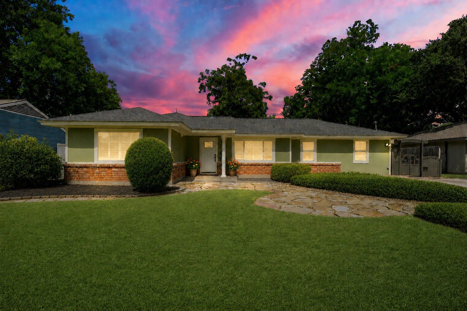 410 Kyle Street, Sugar Land, TX 77478 A winding flagstone walkway and welcoming covered entry create an inviting first impression, hinting at the thoughtful updates waiting inside. New carport not shown.