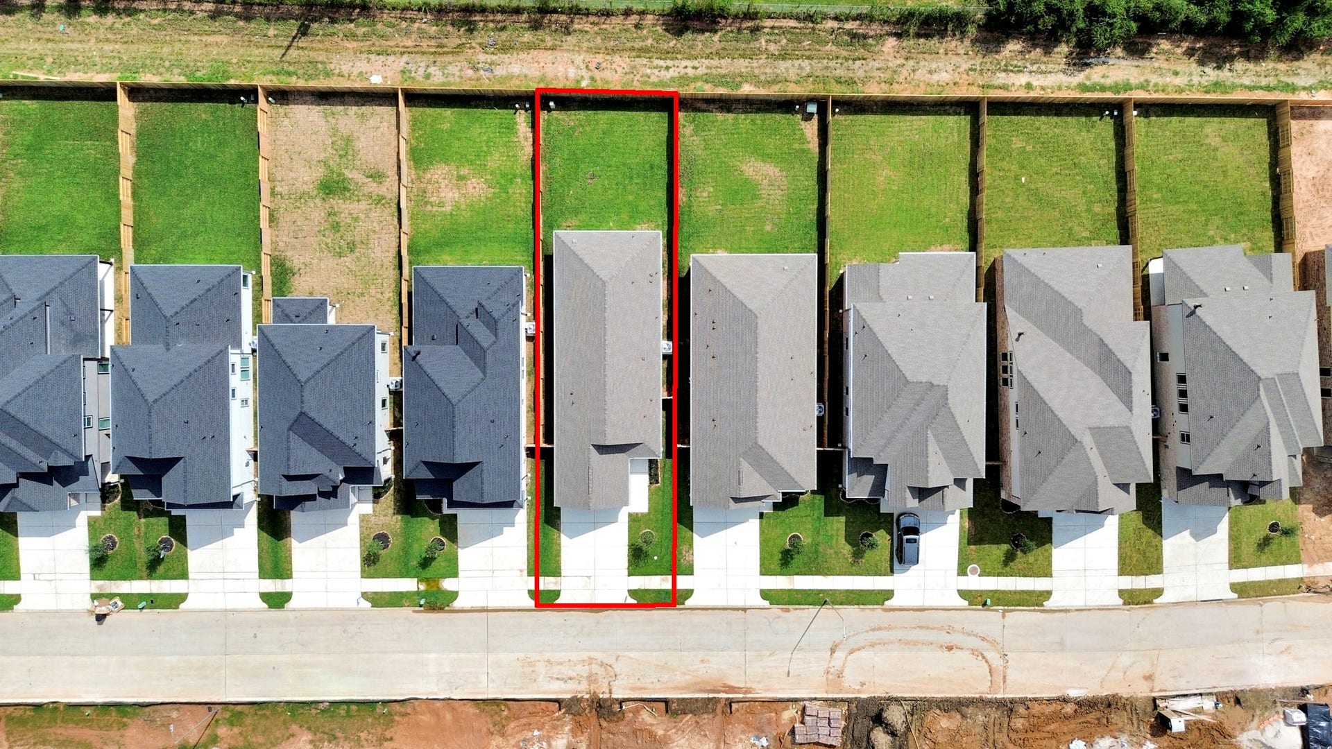 16003 Sycamore Maple Lane, Cypress, TX 77429 An aerial view of a spacious subdivision lot, highlighting a well-maintained yard and a fully fenced perimeter, offering both privacy and expansive outdoor space.