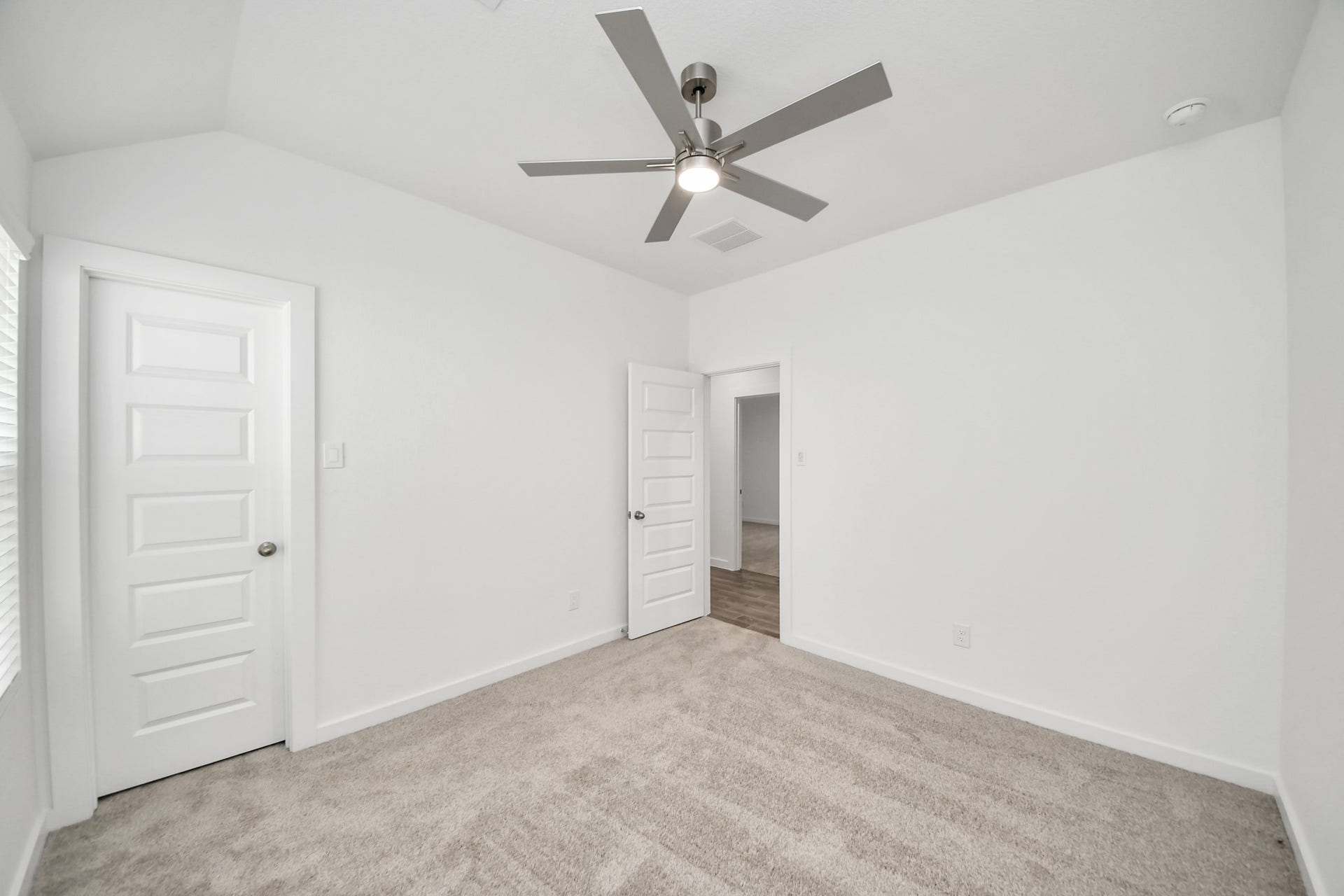 16003 Sycamore Maple Lane, Cypress, TX 77429 Generously sized secondary bedrooms featuring spacious closets, soft and inviting carpeting underfoot, large windows allowing plenty of natural light, and the added touch of privacy blinds for your personal retreat.