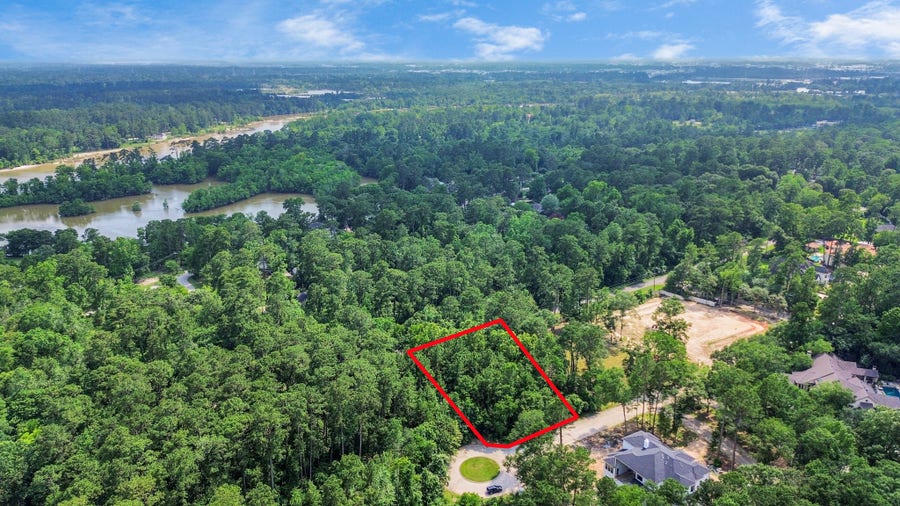 Property photo for 22 Majestic Falls Drive, Kingwood, TX