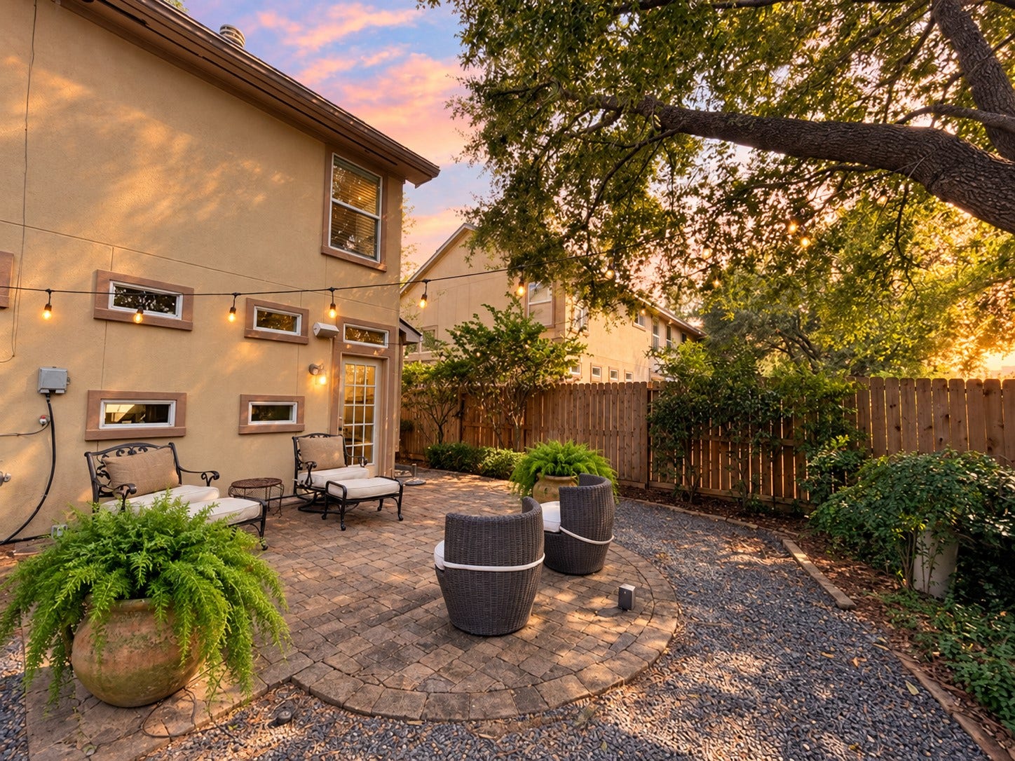 Back yard with enhances sunset sky