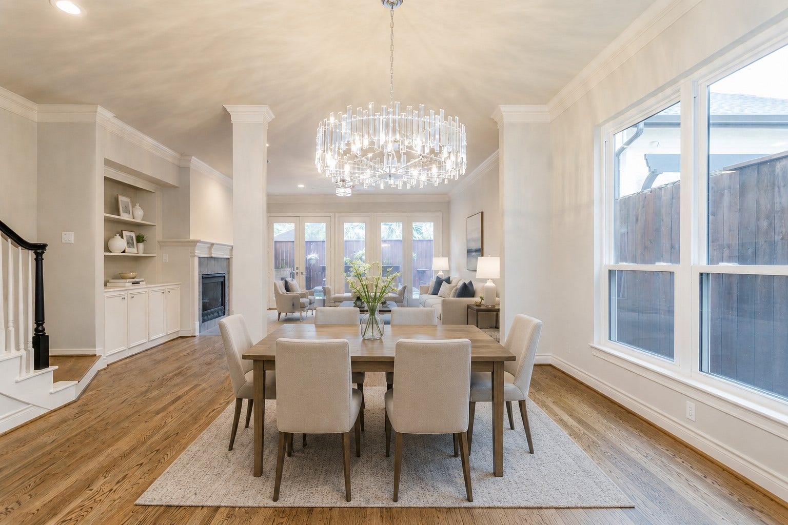 Virtual staging of the open-concept living and dining area.