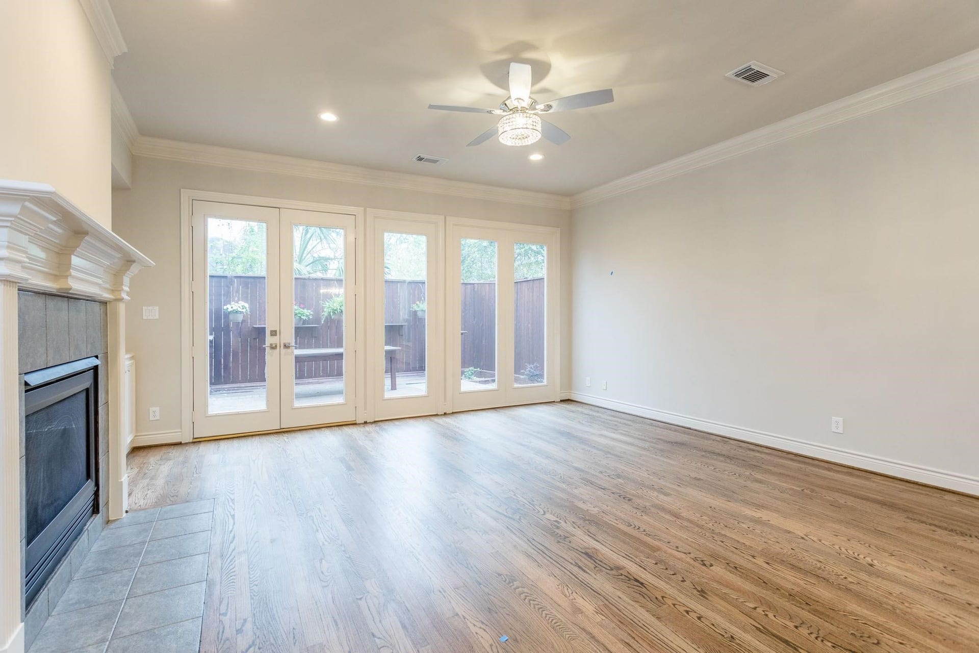 Alternate view of the  living / family area with exit to the backyard and patio.