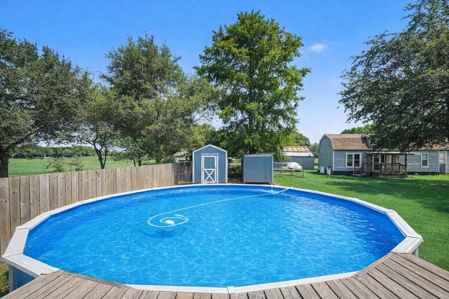 17310 Mcdonald Road, Alvin, TX 77511 Sparkling above ground Pool.