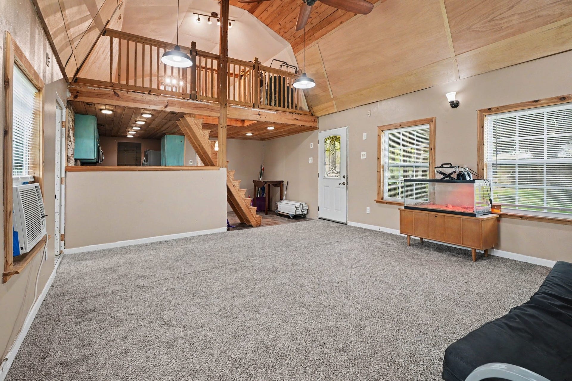 17310 Mcdonald Road, Alvin, TX 77511 Guest house living area with loft and ktchen view