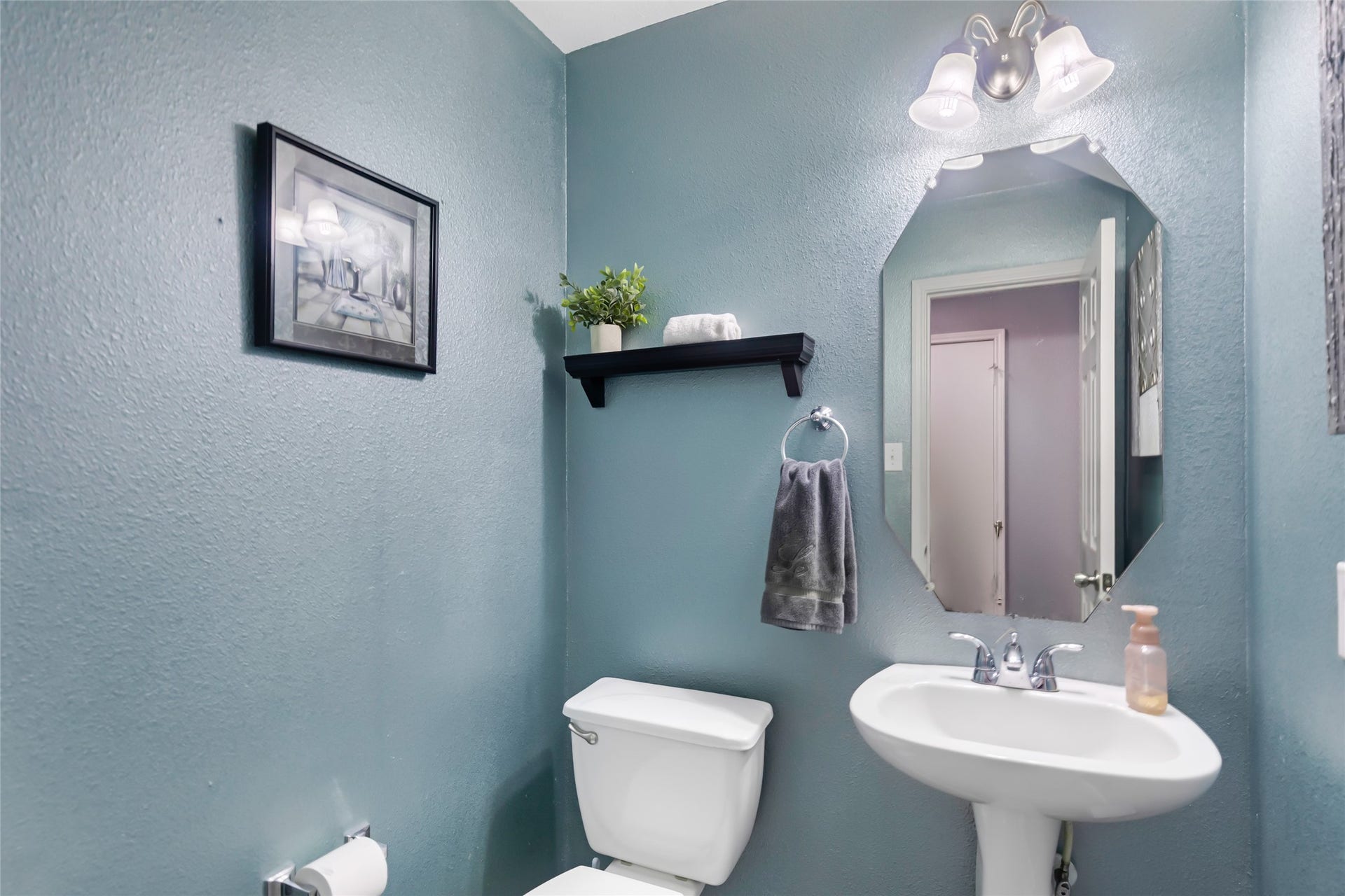 Conveniently located half bath, perfect for guests.