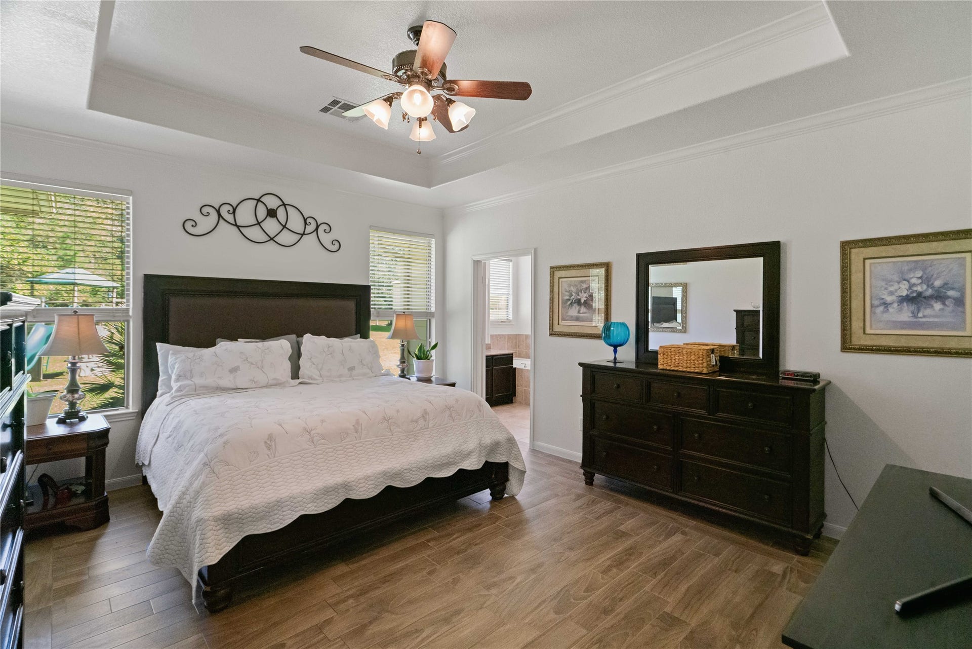 Your own private sanctuary! This spacious primary suite offers a peaceful place to recharge after a long day.