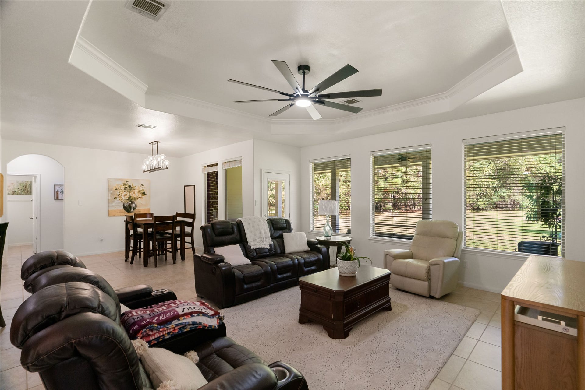 Light, airy, and wonderfully inviting! High ceilings and an open layout create a gathering space that feels like home.