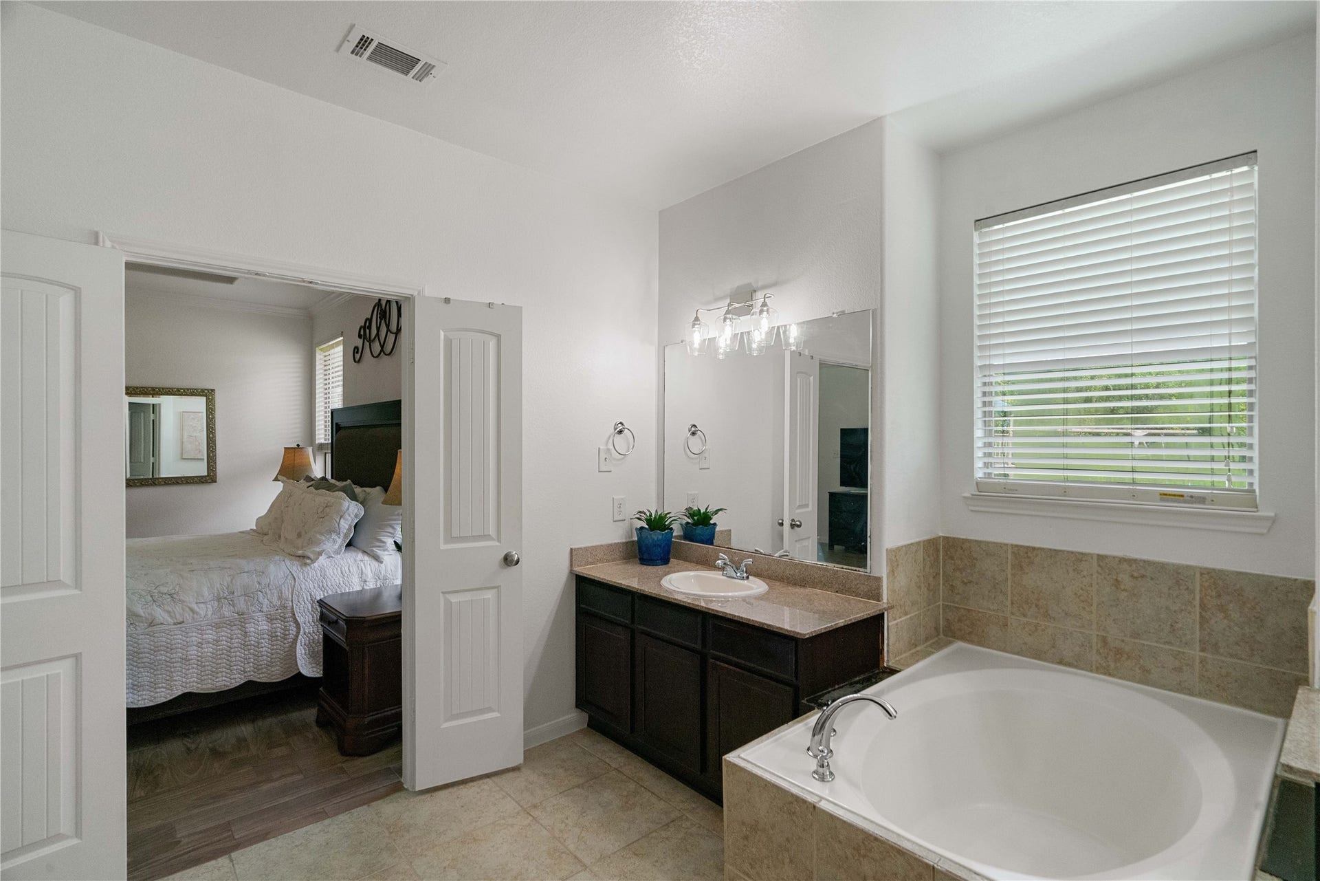 Two sinks, plenty of counter space, and a relaxing soaking tubbecause your morning routine deserves an upgrade!