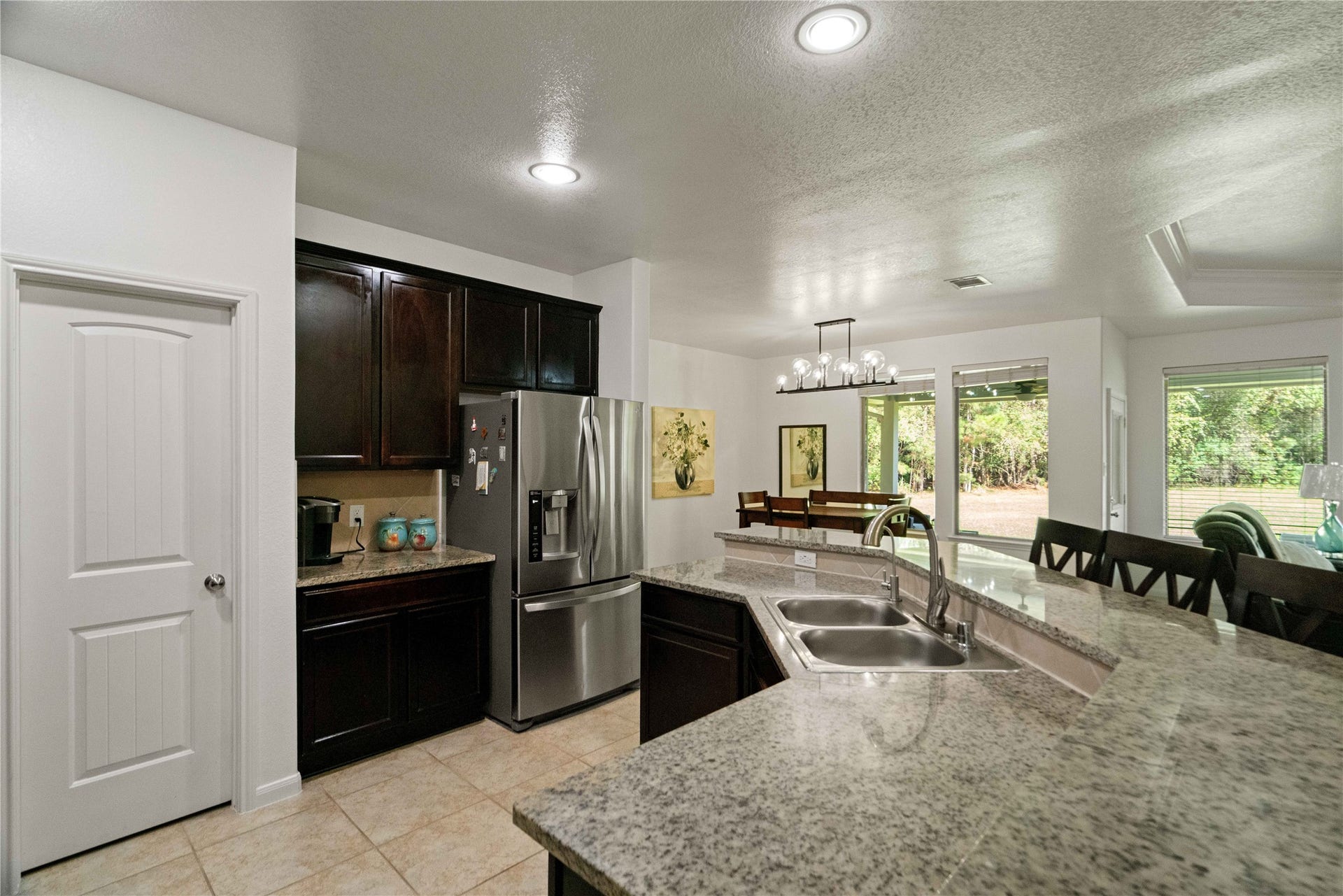 Bright, open, and full of possibility! Enjoy a kitchen that flows effortlessly into the living spaces, making entertaining a breeze.