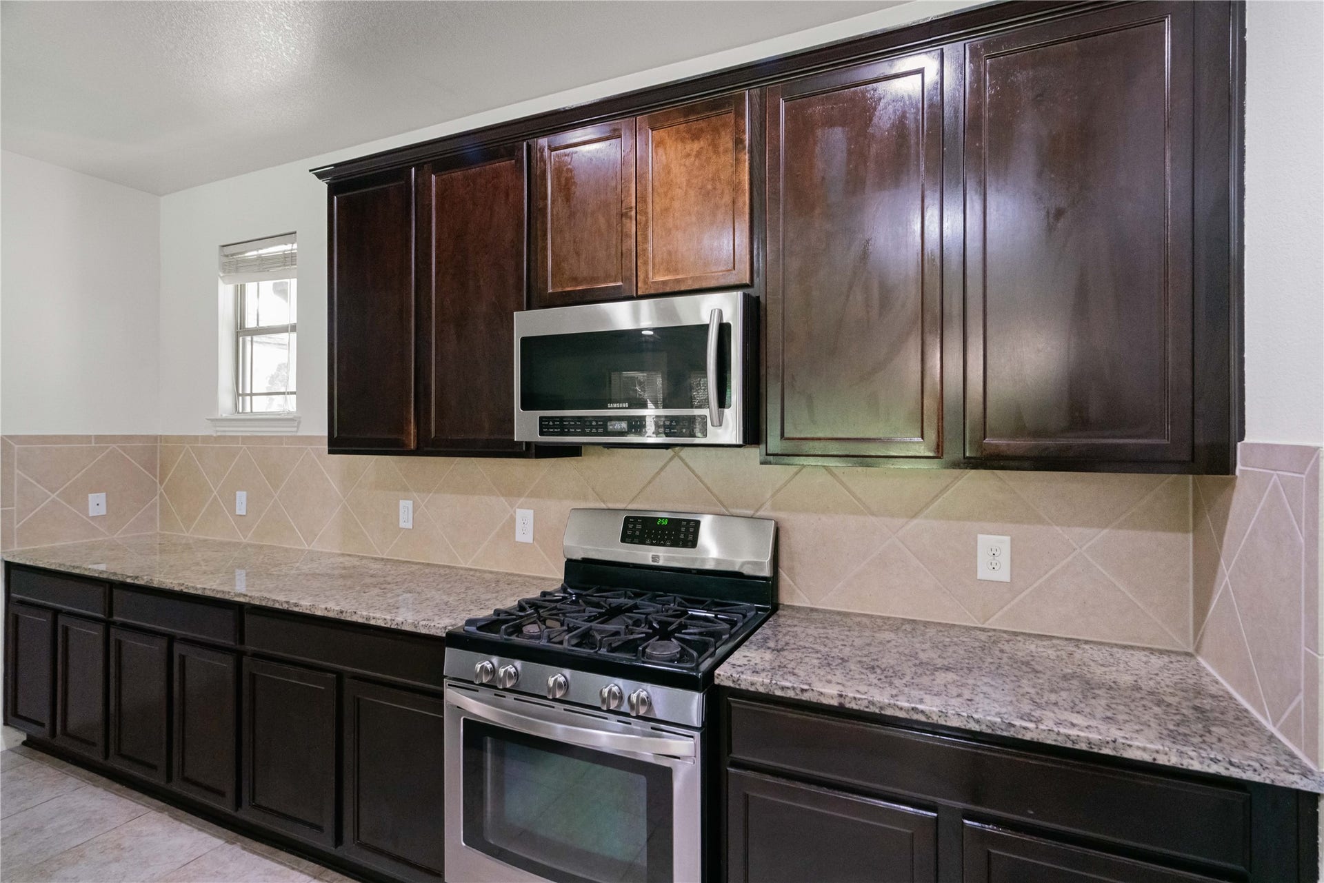 A kitchen designed for real life! Abundant cabinetry, stainless appliances, and plenty of workspace make cooking a pleasure.