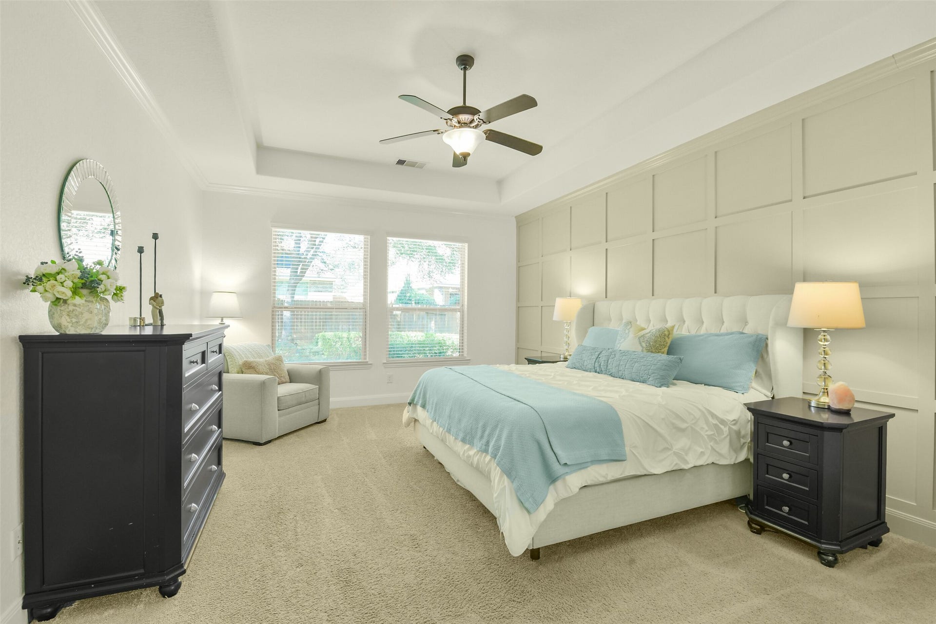 119 Finchfield Place, Montgomery, TX 77316 Spacious bedroom featuring neutral finishes, ceiling fan, and abundant natural light.