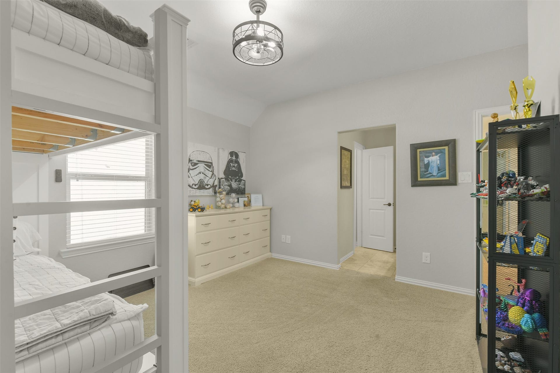 119 Finchfield Place, Montgomery, TX 77316 Versatile upstairs bonus room offering flexible space for a game room, playroom, or hobby area.