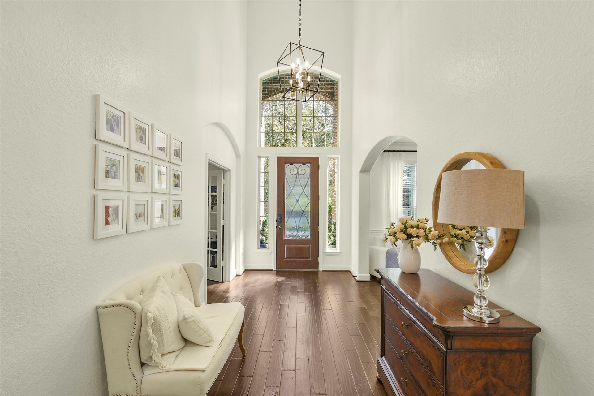 119 Finchfield Place, Montgomery, TX 77316 Light-filled foyer with high ceilings, decorative lighting, and beautiful architectural details.