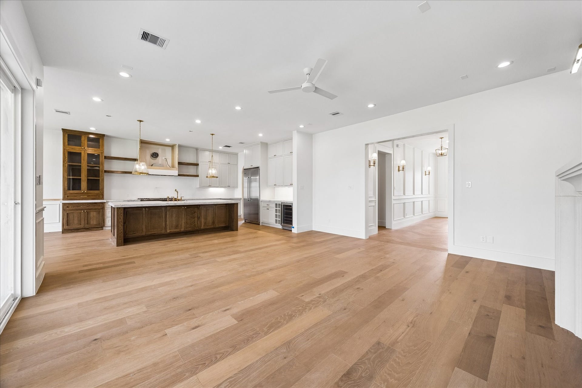 1726 Chantilly Lane, Houston, TX 77018 This view shows the connection between the living room and island kitchen. Continuous flooring and open sightlines support a flexible arrangement for seating and everyday gatherings.