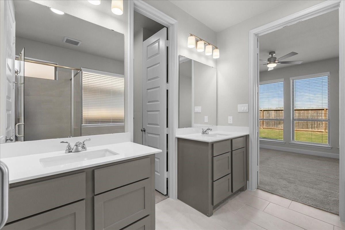 19007 Satsuma Ridge Drive, Manvel, TX 77578 Two separate sink areas.