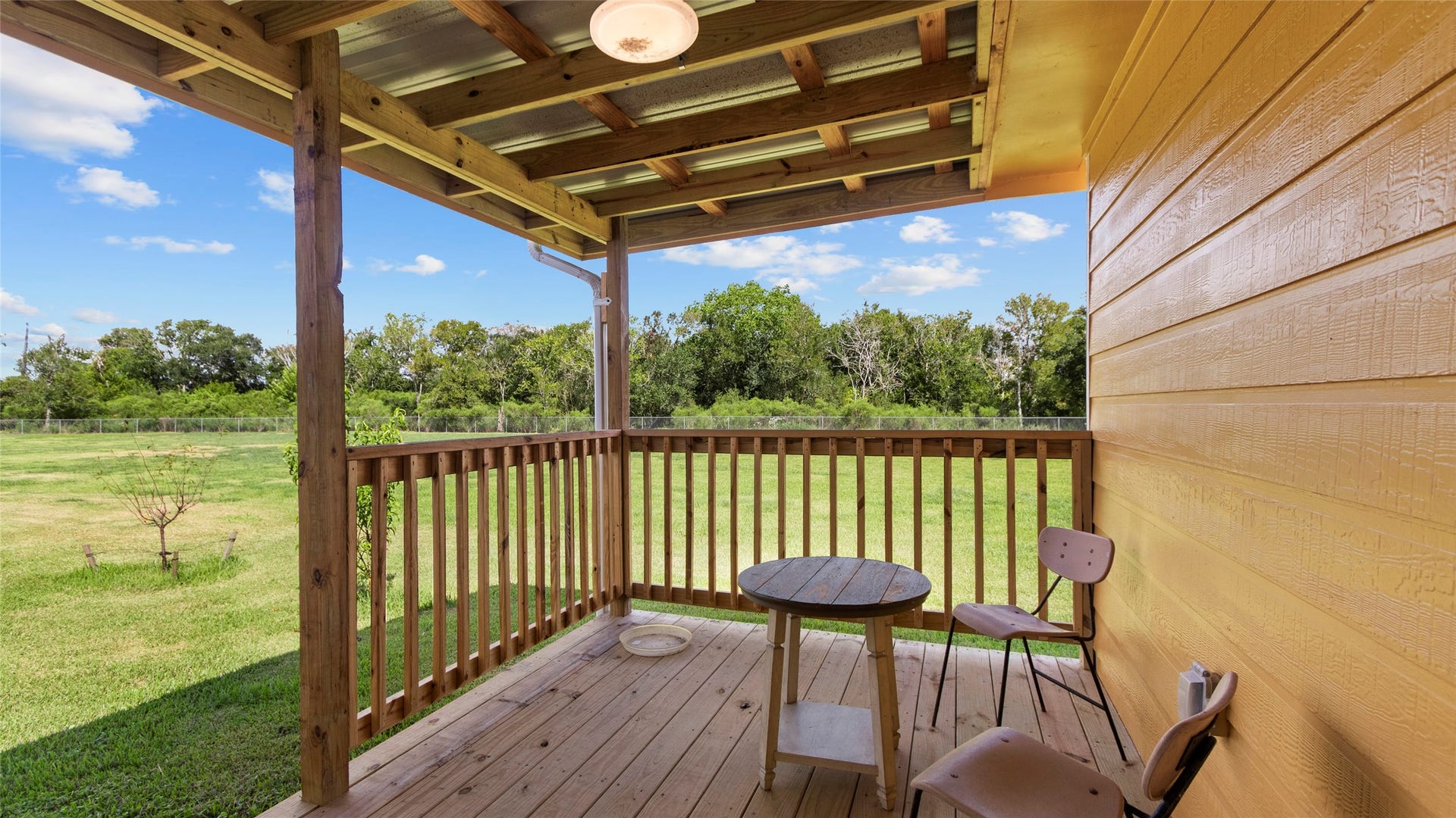 11723 County Road 458, #FM523, Angleton, TX 77515 COVERED DECK PORCH REAR OF HOME, ADDED 2026
