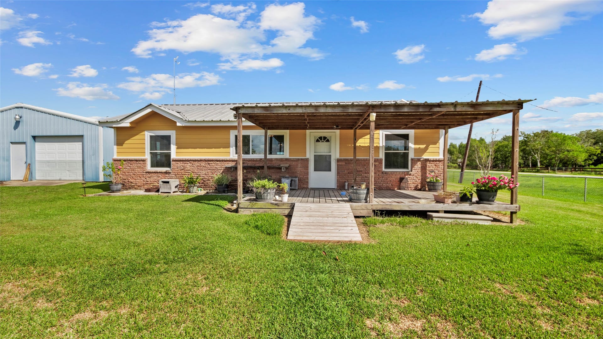 11723 County Road 458, #FM523, Angleton, TX 77515 FRONT VIEW OF MAIN HOUSE W/DETACHED 2 VEHICLE CARPORT