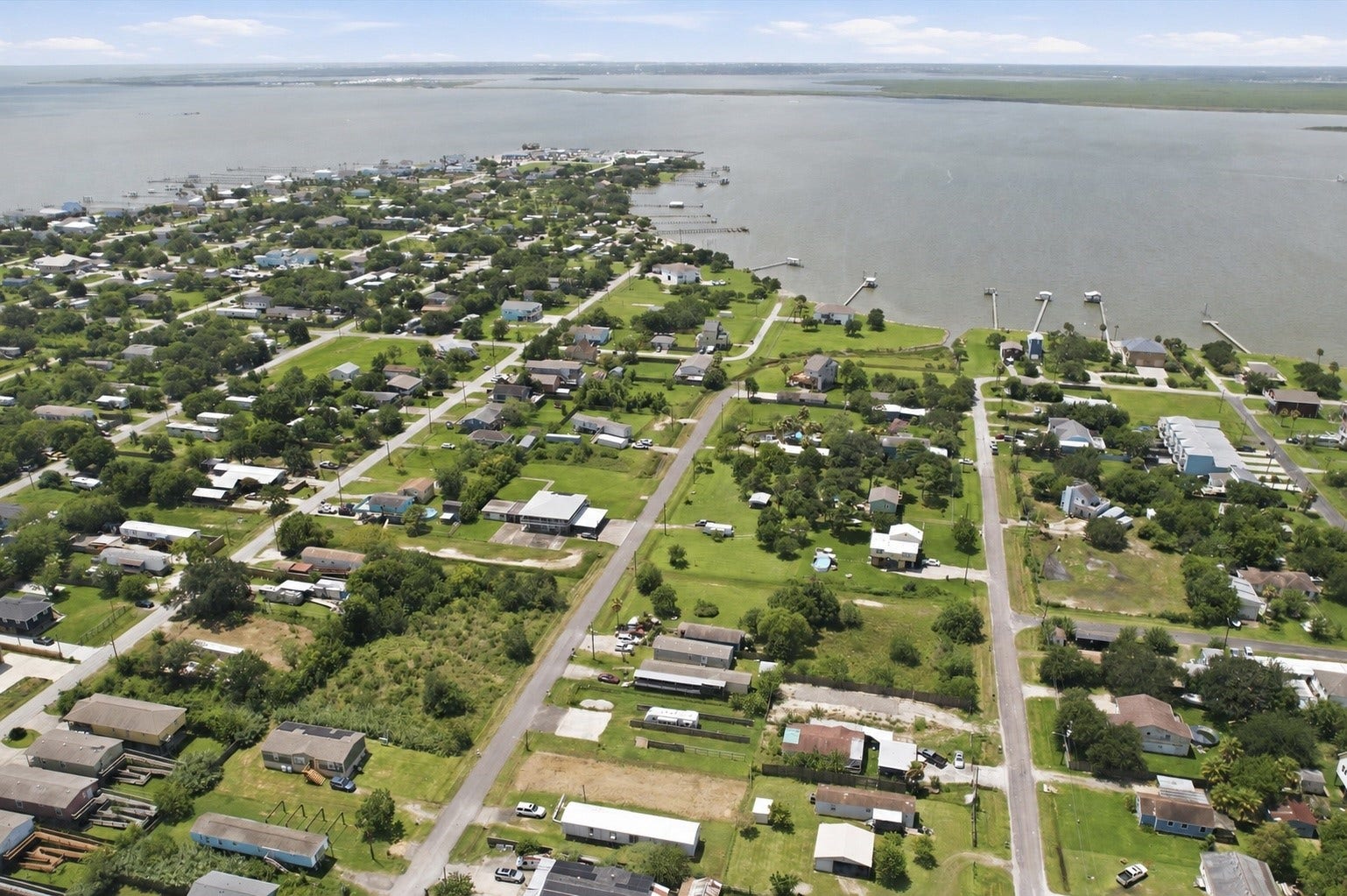 932 13th Street, Dickinson, TX 77539 About 7-9 lots from the water.