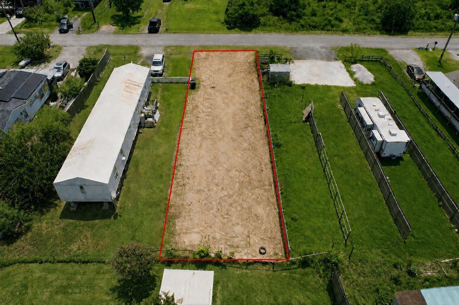 932 13th Street, Dickinson, TX 77539 Aerial View from rear. Centerpoint added two utility poles, one with new light, Aug 2026 on either side of front of the lot.