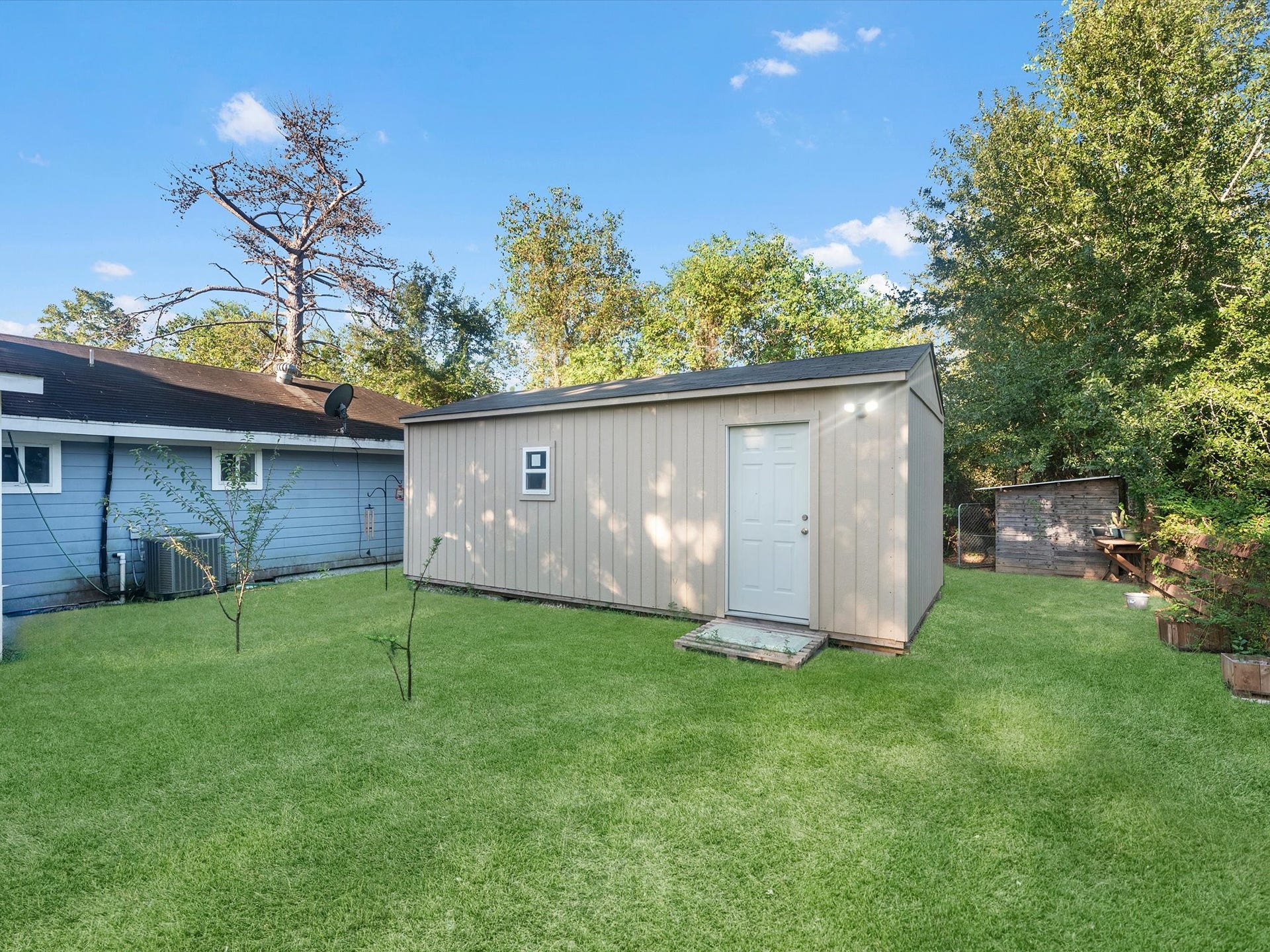 32403 Dobbin Huffsmith Road, Magnolia, TX 77354 Structure 5 offers approximately 200 sq ft of bonus space with new sheetrock and updated electrical work, providing a versatile space for a variety of uses.