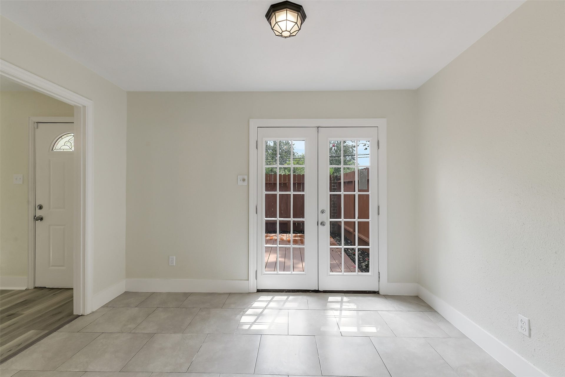 Open the French doors and let the courtyard become part of the dining experience