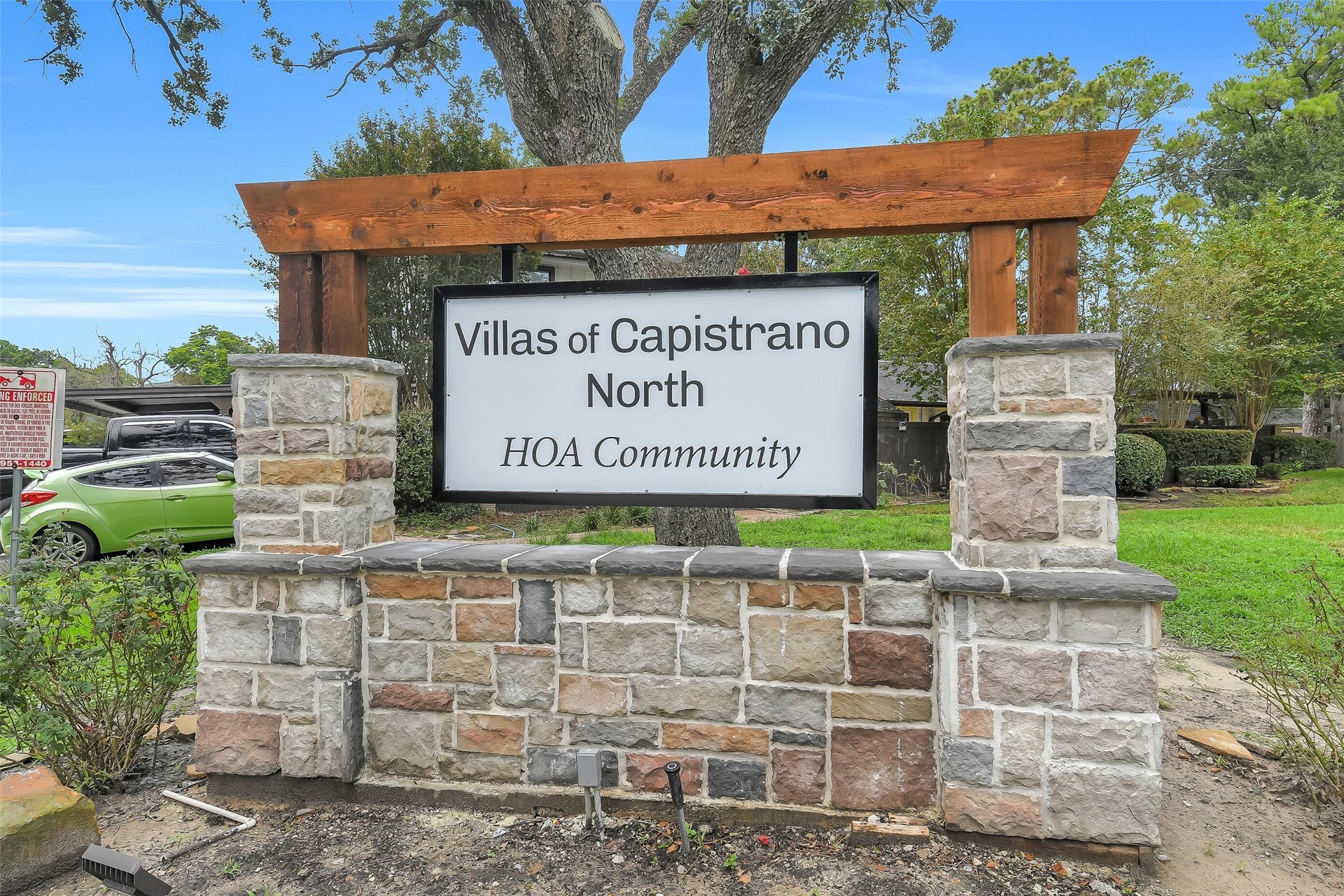 Welcome to Villas of Capistrano North, an established HOA community tucked beneath mature trees