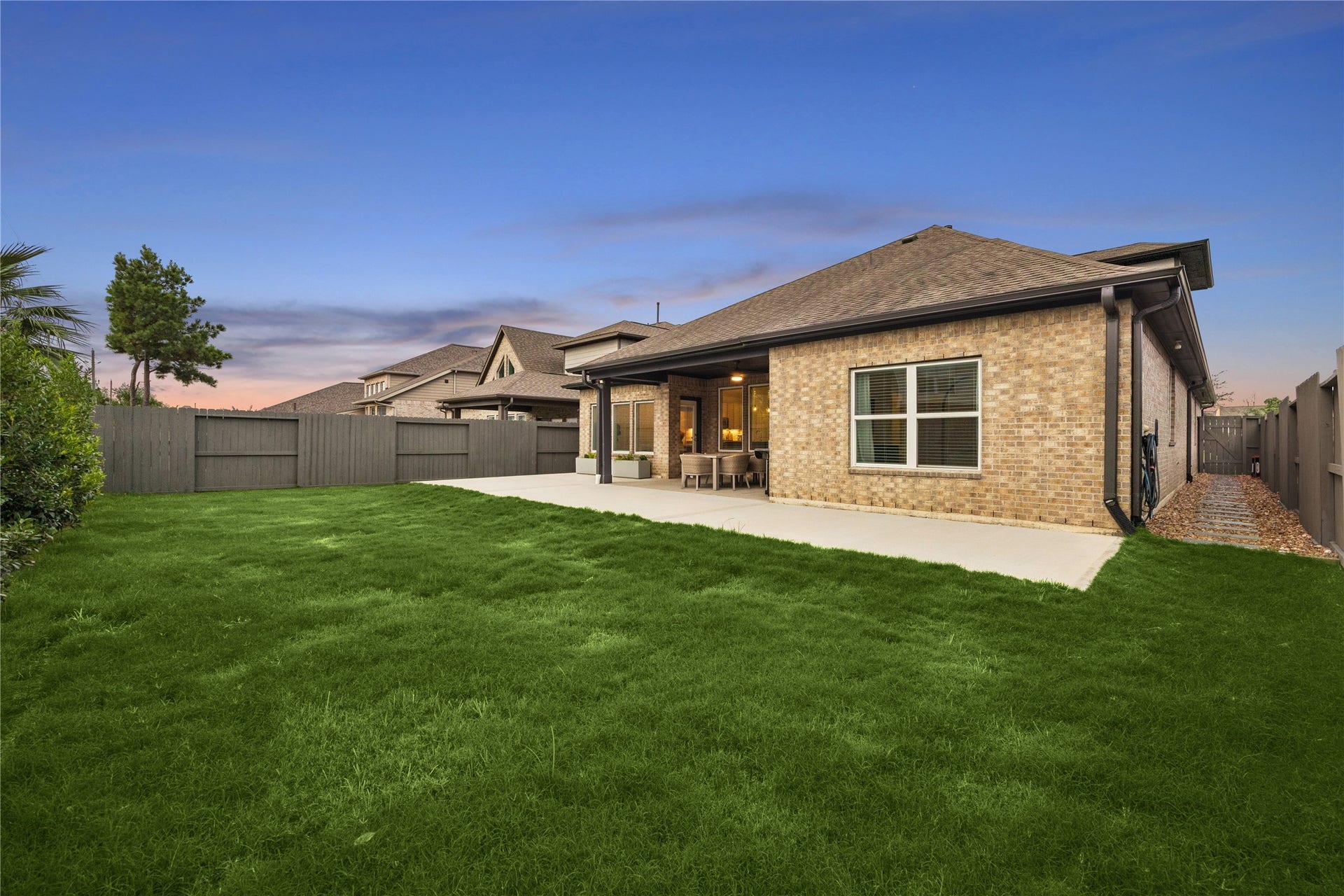 14231 Archer County Trail, Cypress, TX 77429 large 7,425sqft lot. back patio addition, side pavers and rock with lush low maintenance landscaping.