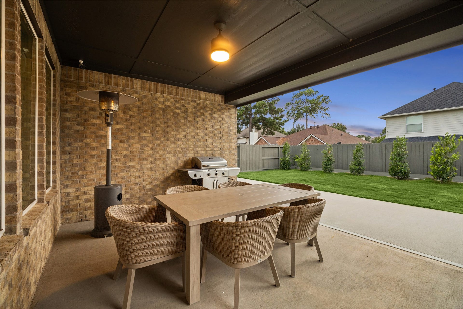 14231 Archer County Trail, Cypress, TX 77429 expanded back patio & Eagleston Holly trees added in.