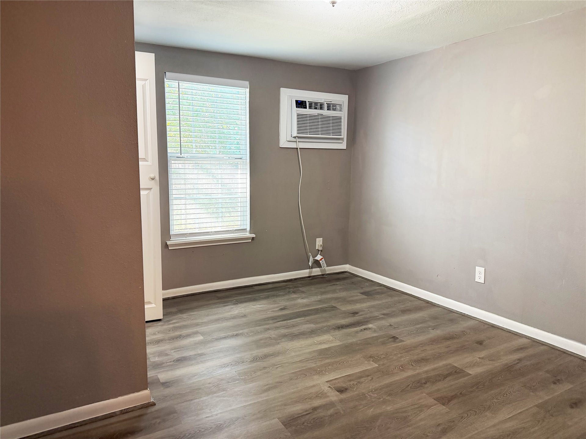 1302 N Avenue R, Freeport, TX 77541 Garage apartment includes two separate bedrooms, each offering functional space for bedroom furnishings and storage.