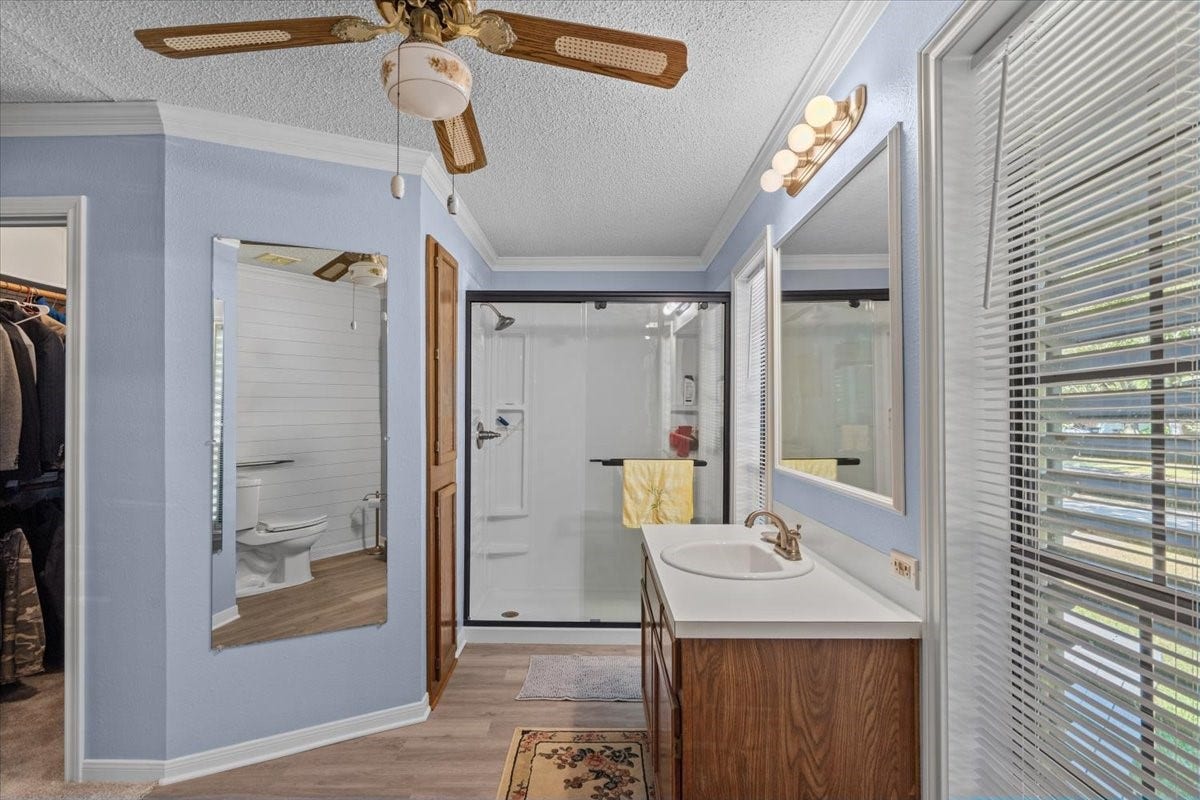 8717 Acorn Lane, Hitchcock, TX 77563 Primary bathroom shower area.