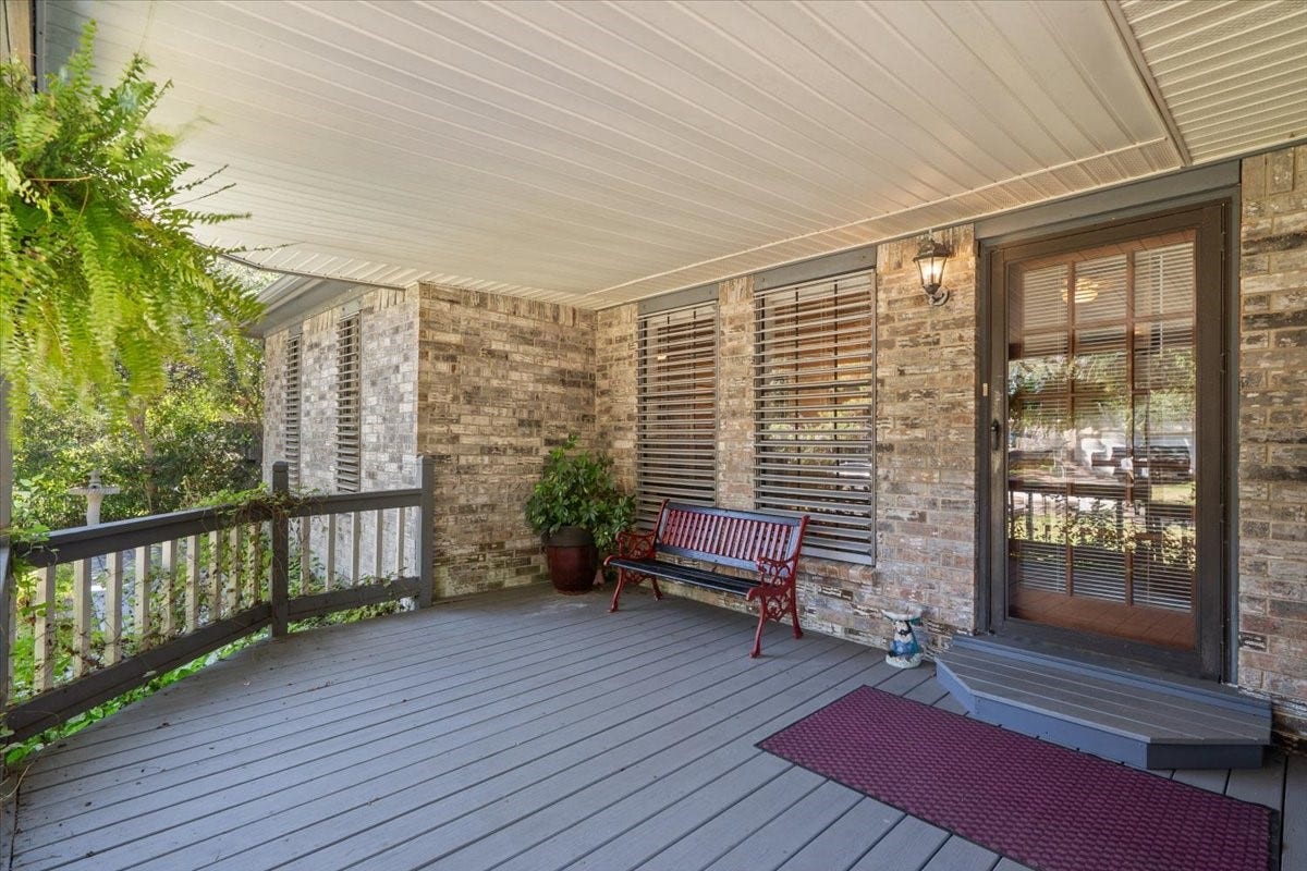 8717 Acorn Lane, Hitchcock, TX 77563 Front patio that is large enough for sitting area.
