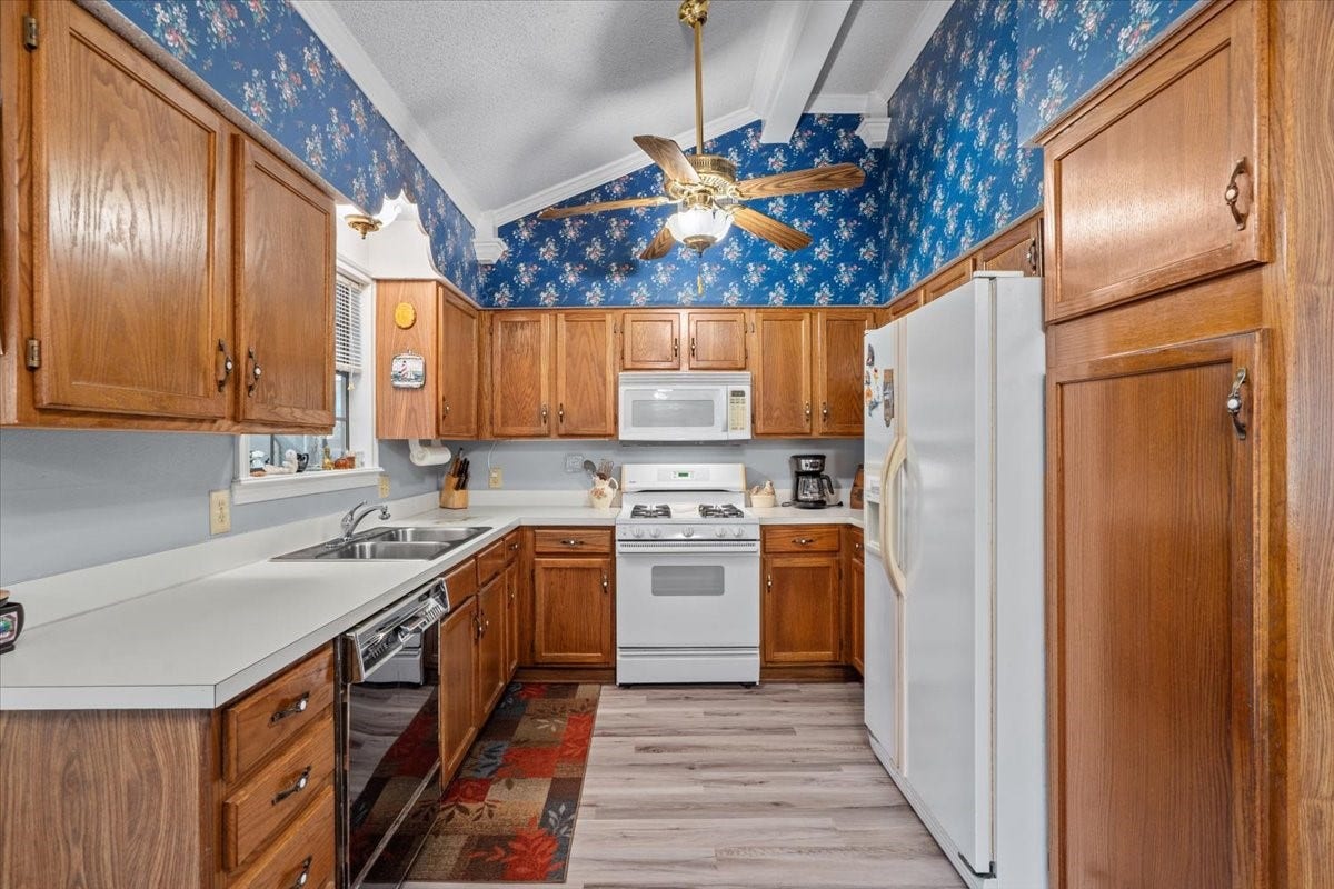 8717 Acorn Lane, Hitchcock, TX 77563 Kitchen with plenty of storage.